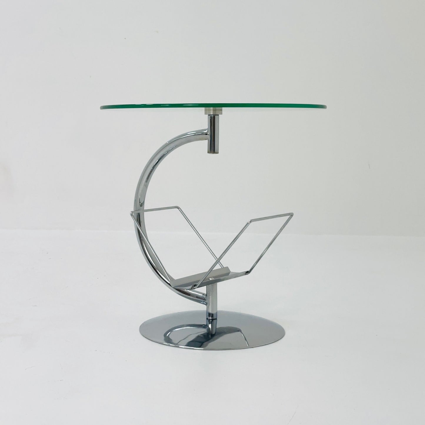 Mid century designer side table / magazine table. chrome and glass top, Italy