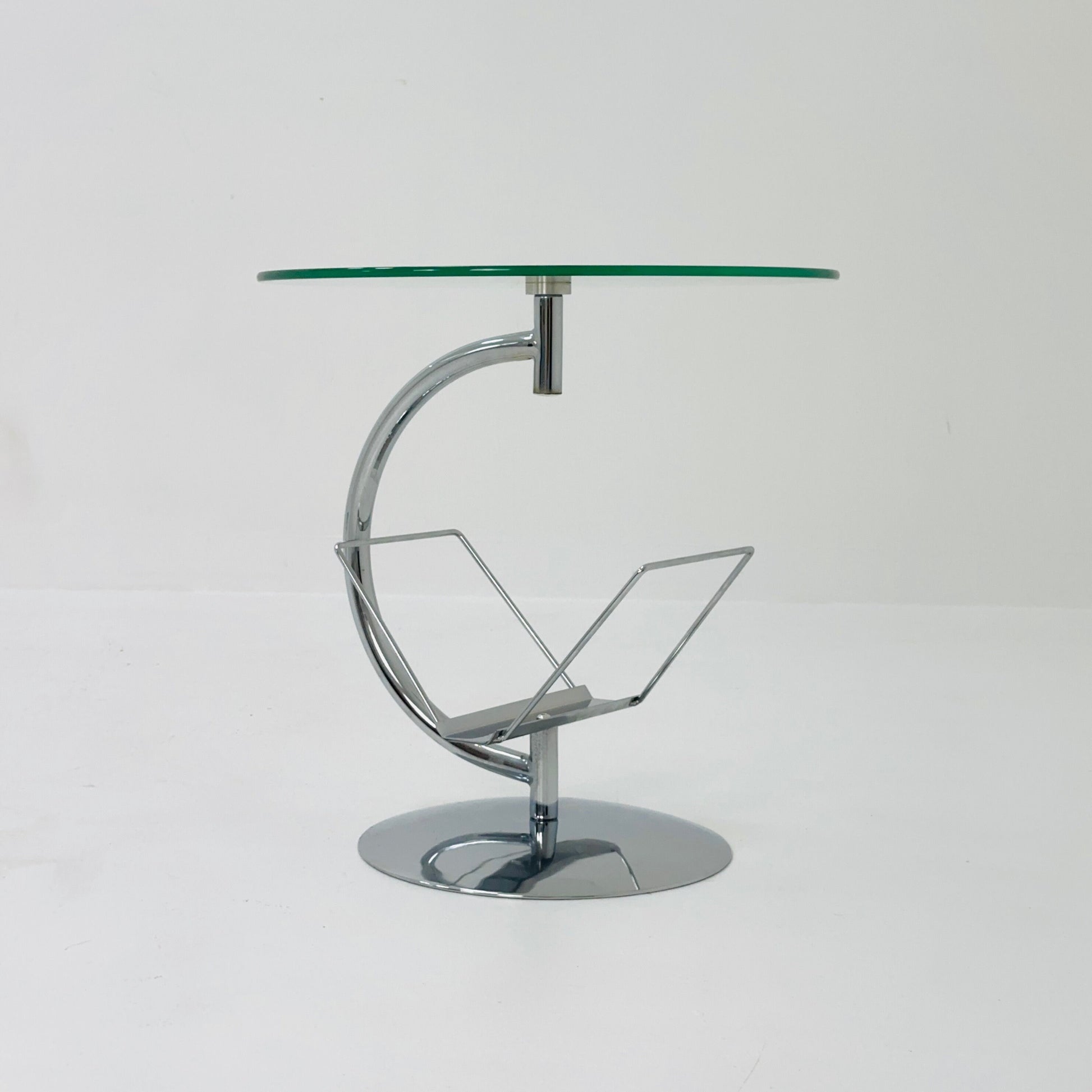 Mid century designer side table / magazine table. chrome and glass top, Italy