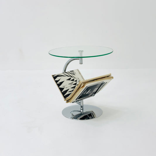 Mid century designer side table / magazine table. chrome and glass top, Italy
