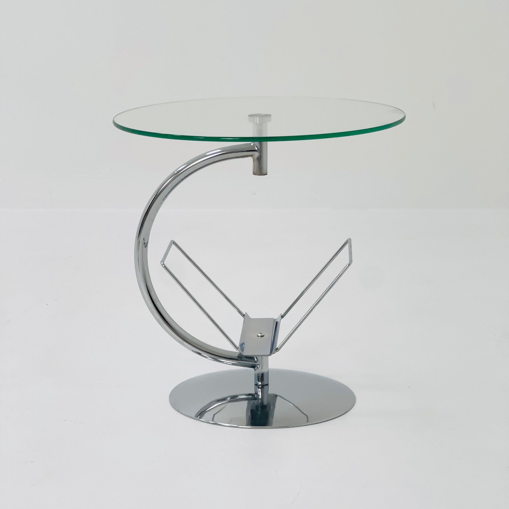 Mid century designer side table / magazine table. chrome and glass top, Italy