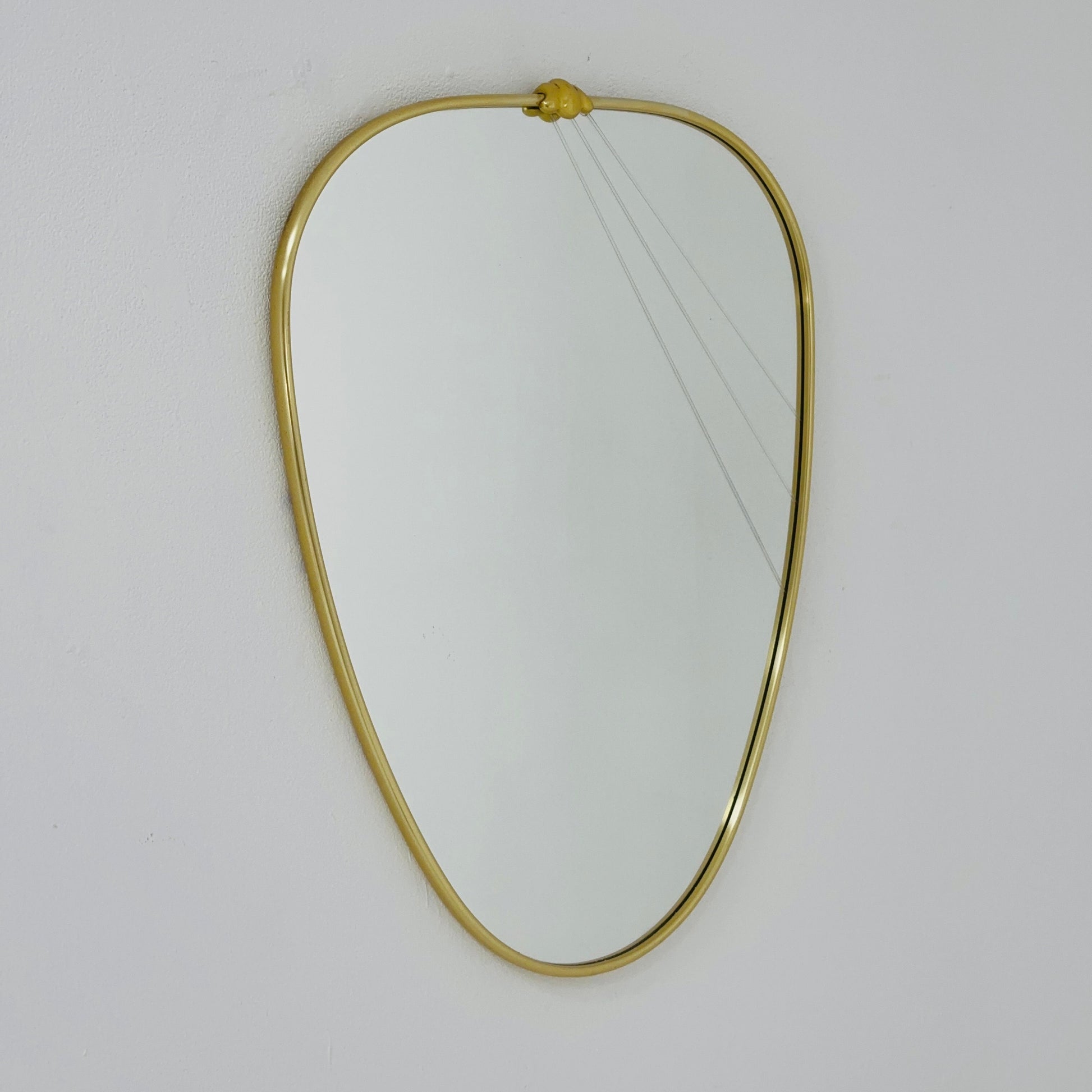 Mid Century asymmetric German brass Original kidney wall mirror from the 60s model number 986