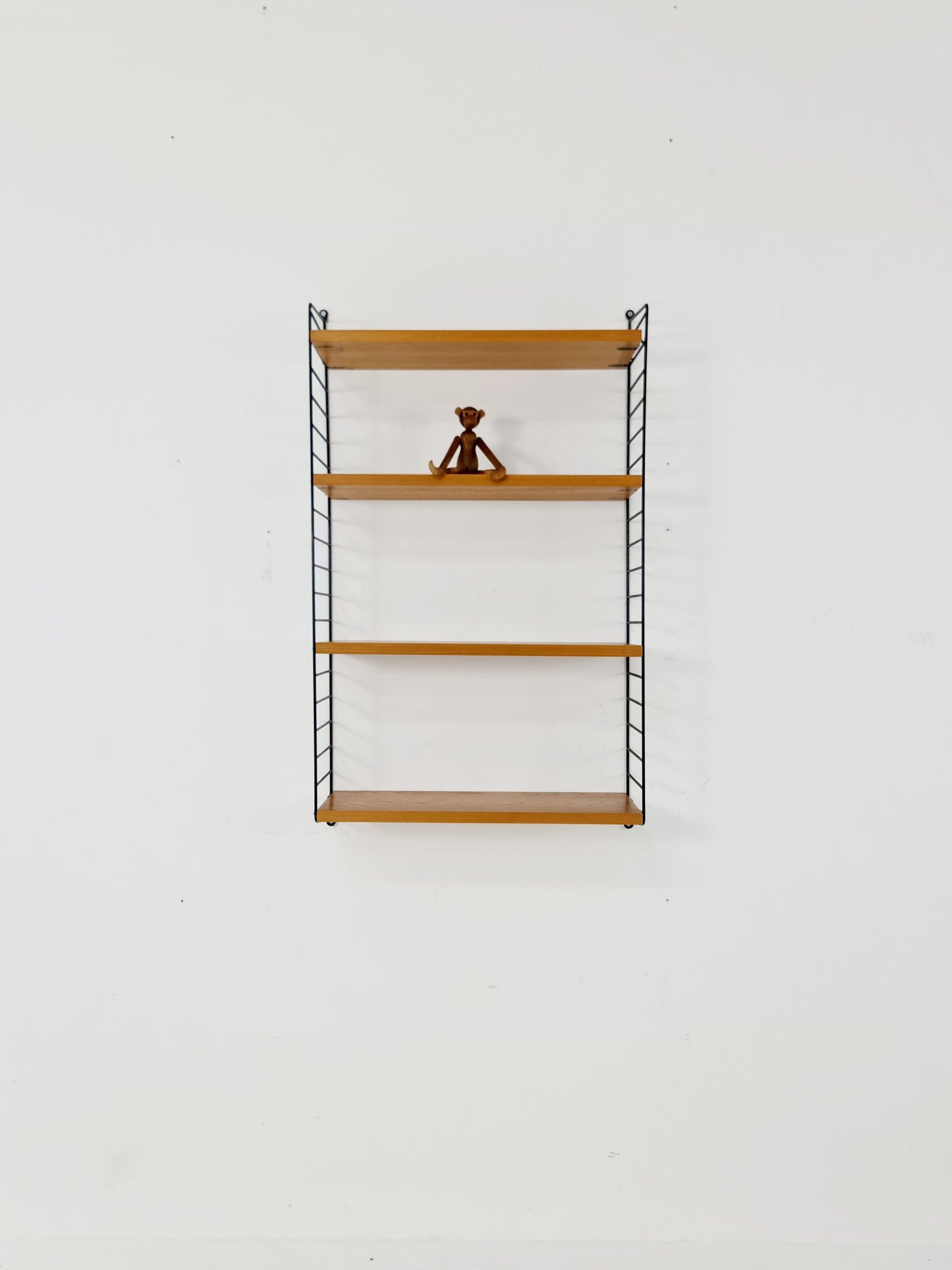 Original MCM Ash shelving system - consists of Black lacquered metal ladders, from string Stockholm 1960s