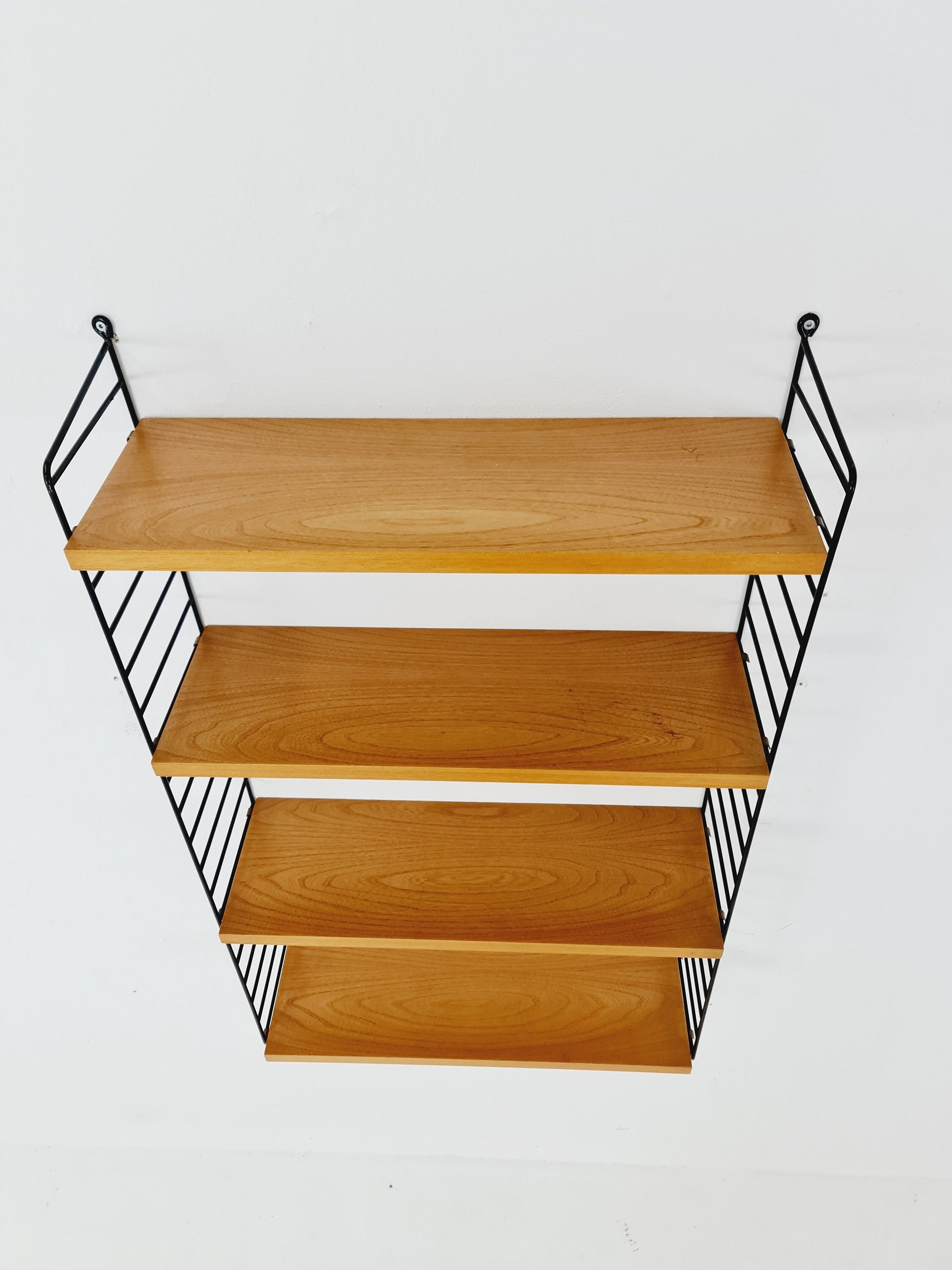 Original MCM Ash shelving system - consists of Black lacquered metal ladders, from string Stockholm 1960s