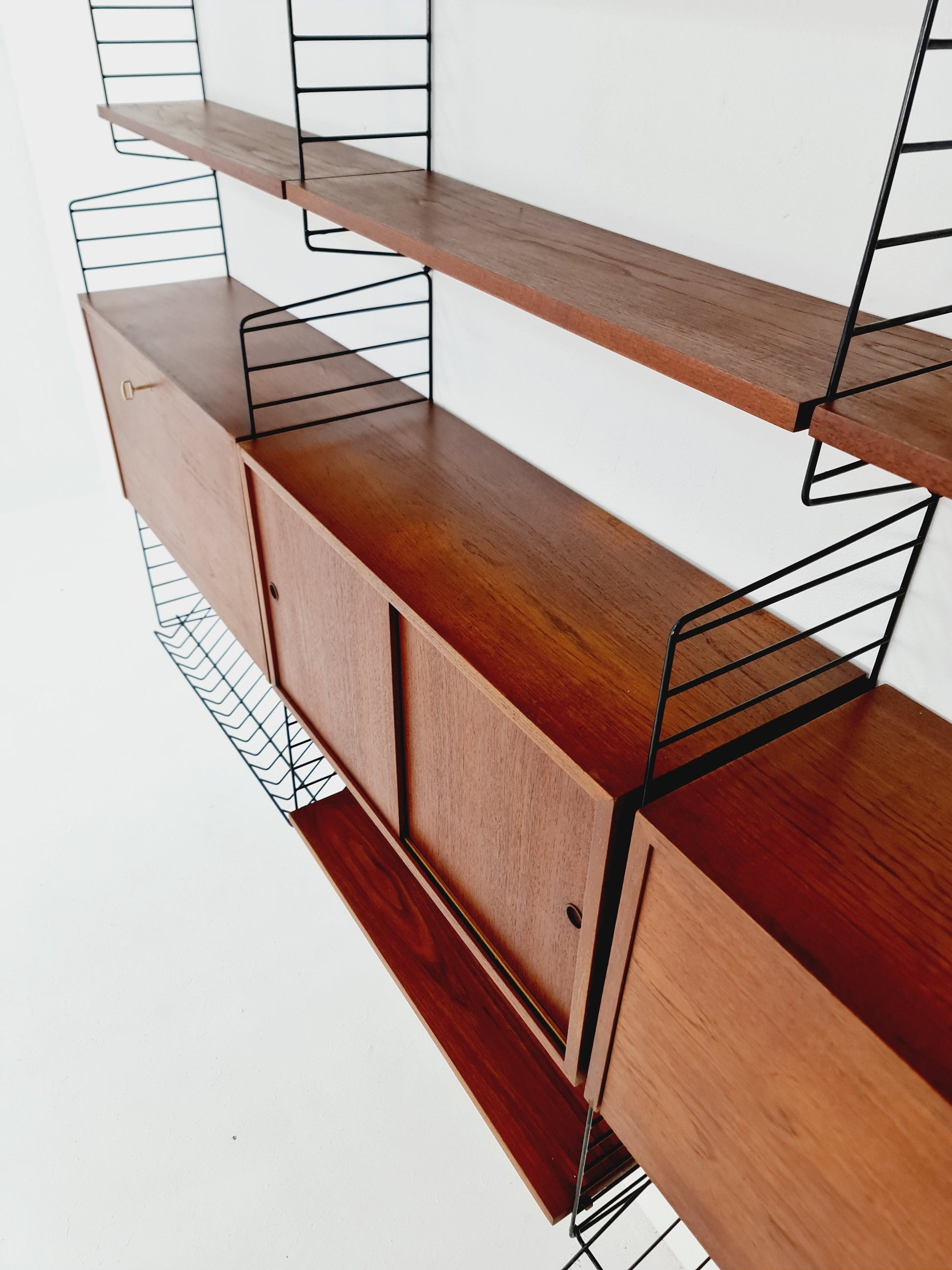Wall-mounted original Swedish string shelf-system, bookcase teak by Nils & Kajsa Strinning, 1960s