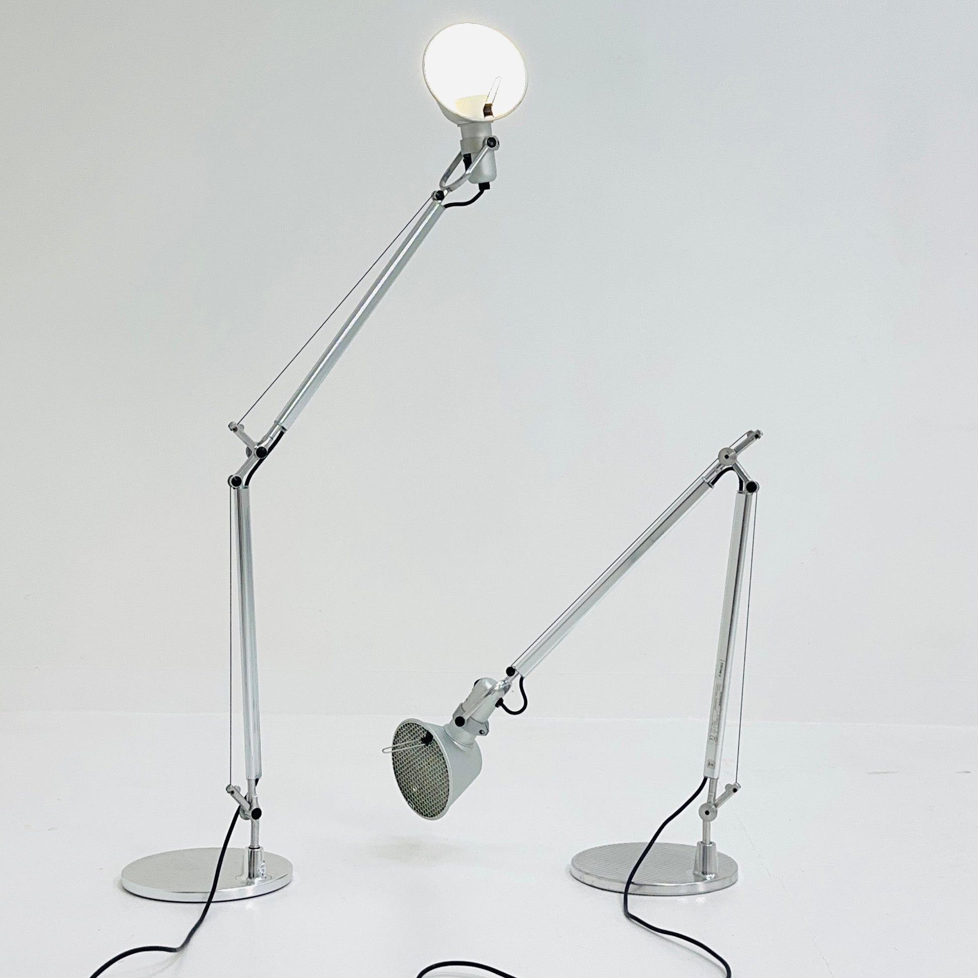 A pair of 'Tolomeo' desktop lamps by Michele De Lucchi & Giancarlo Fassina for Artemide. Italy