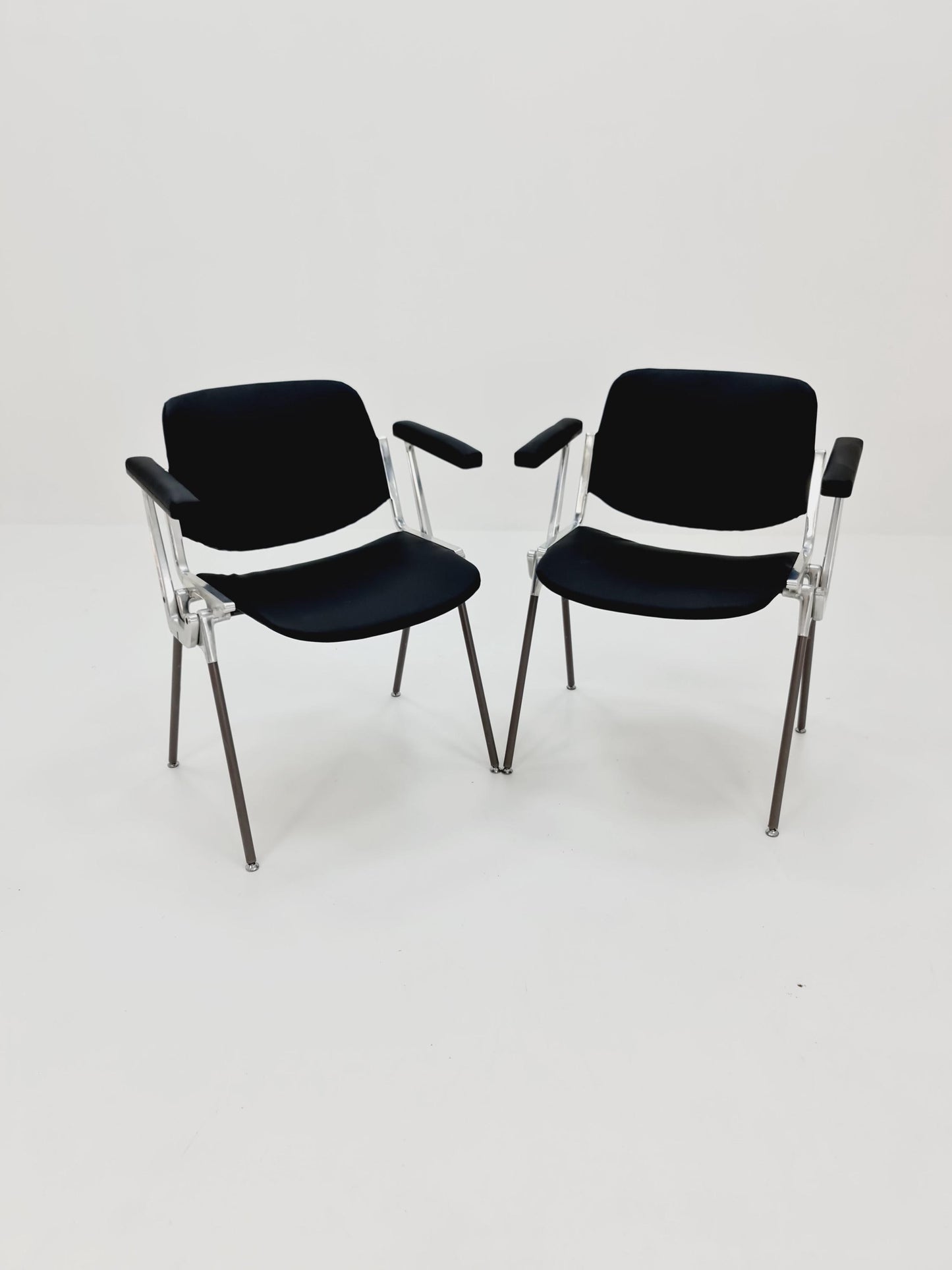 1 / 2 Italian black leatherite Castelli arm chairs by Giancarlo Piretti, 1970s