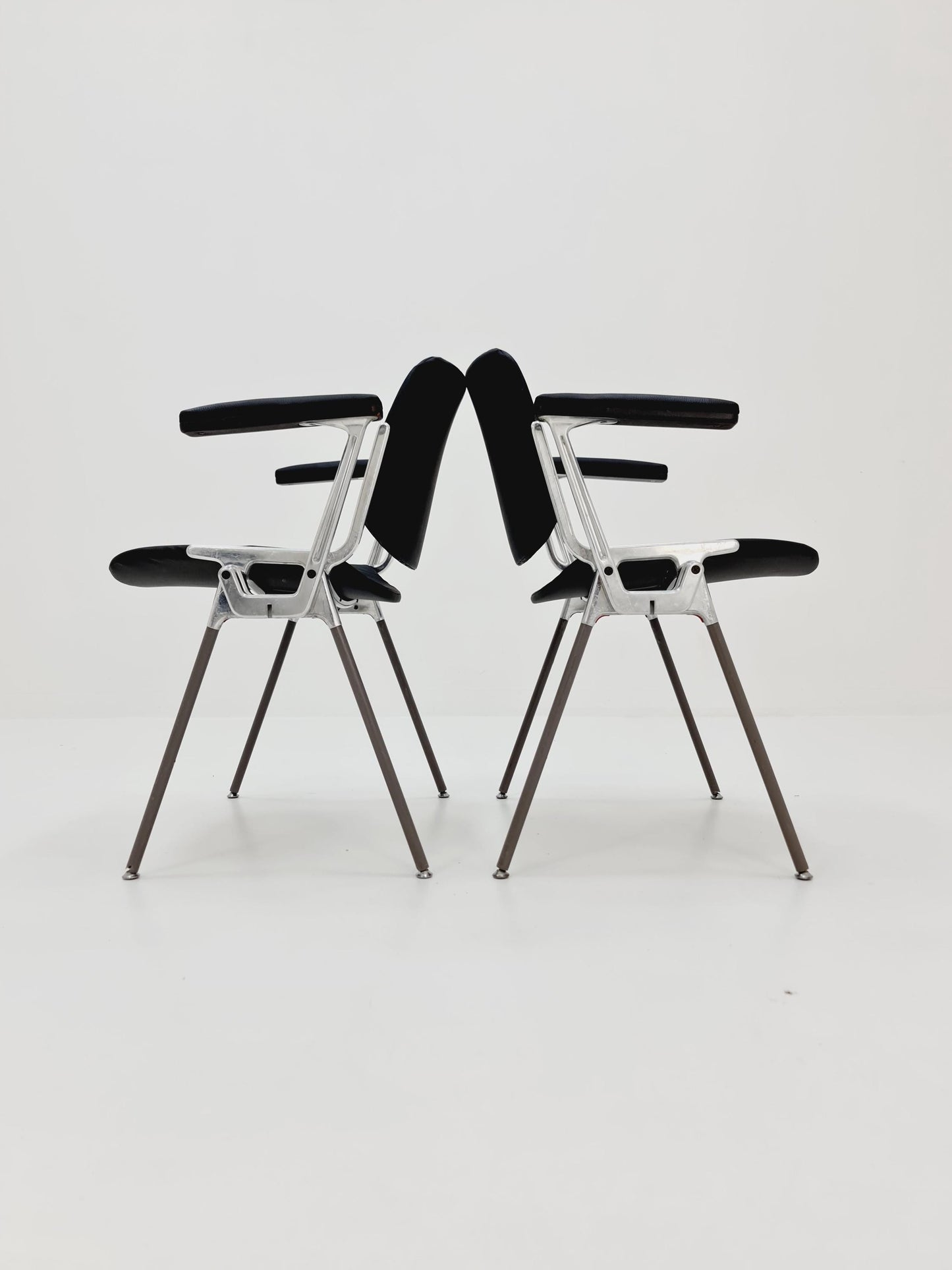 1 / 2 Italian black leatherite Castelli arm chairs by Giancarlo Piretti, 1970s