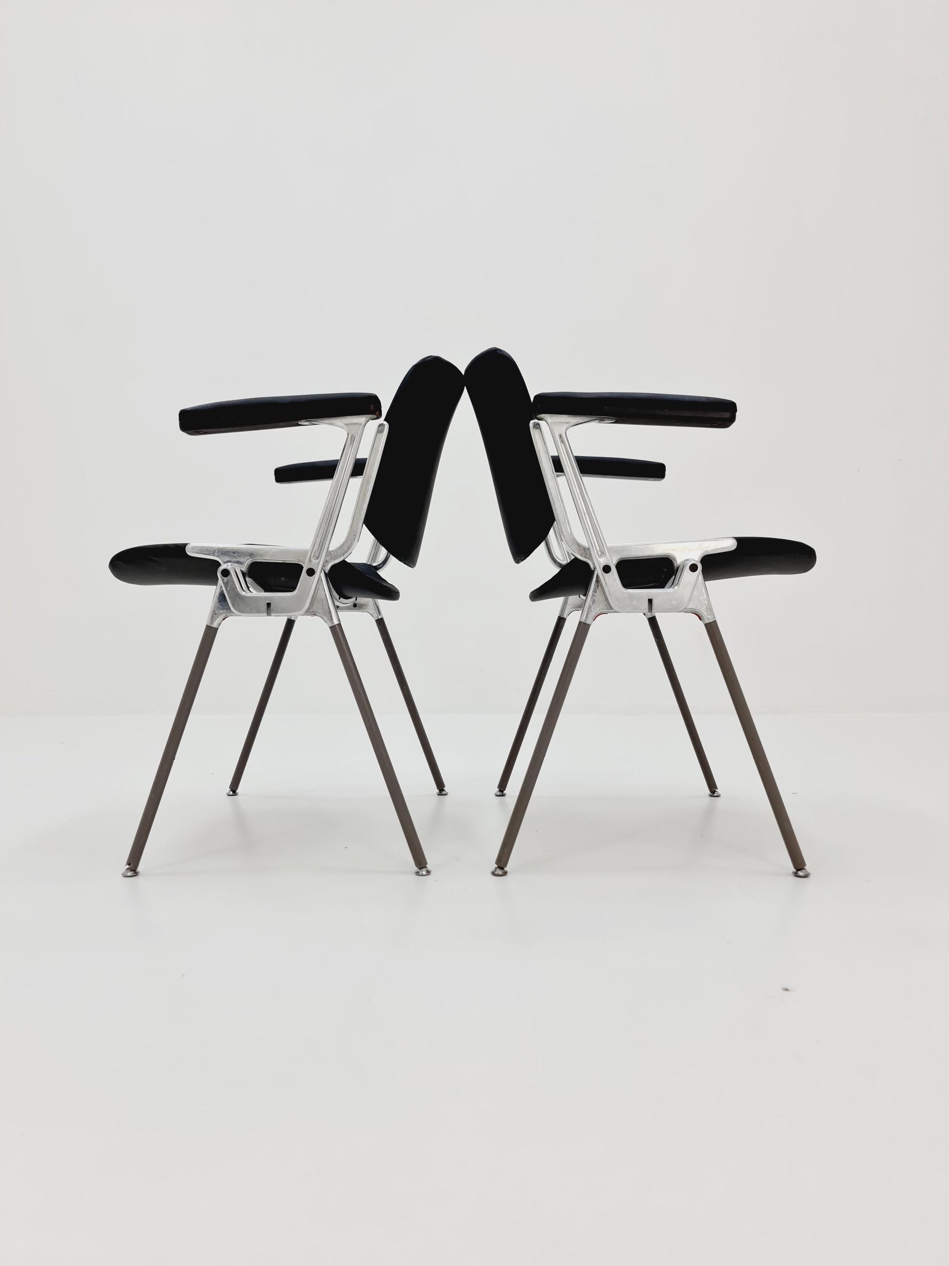 1 / 2 Italian black leatherite Castelli arm chairs by Giancarlo Piretti, 1970s