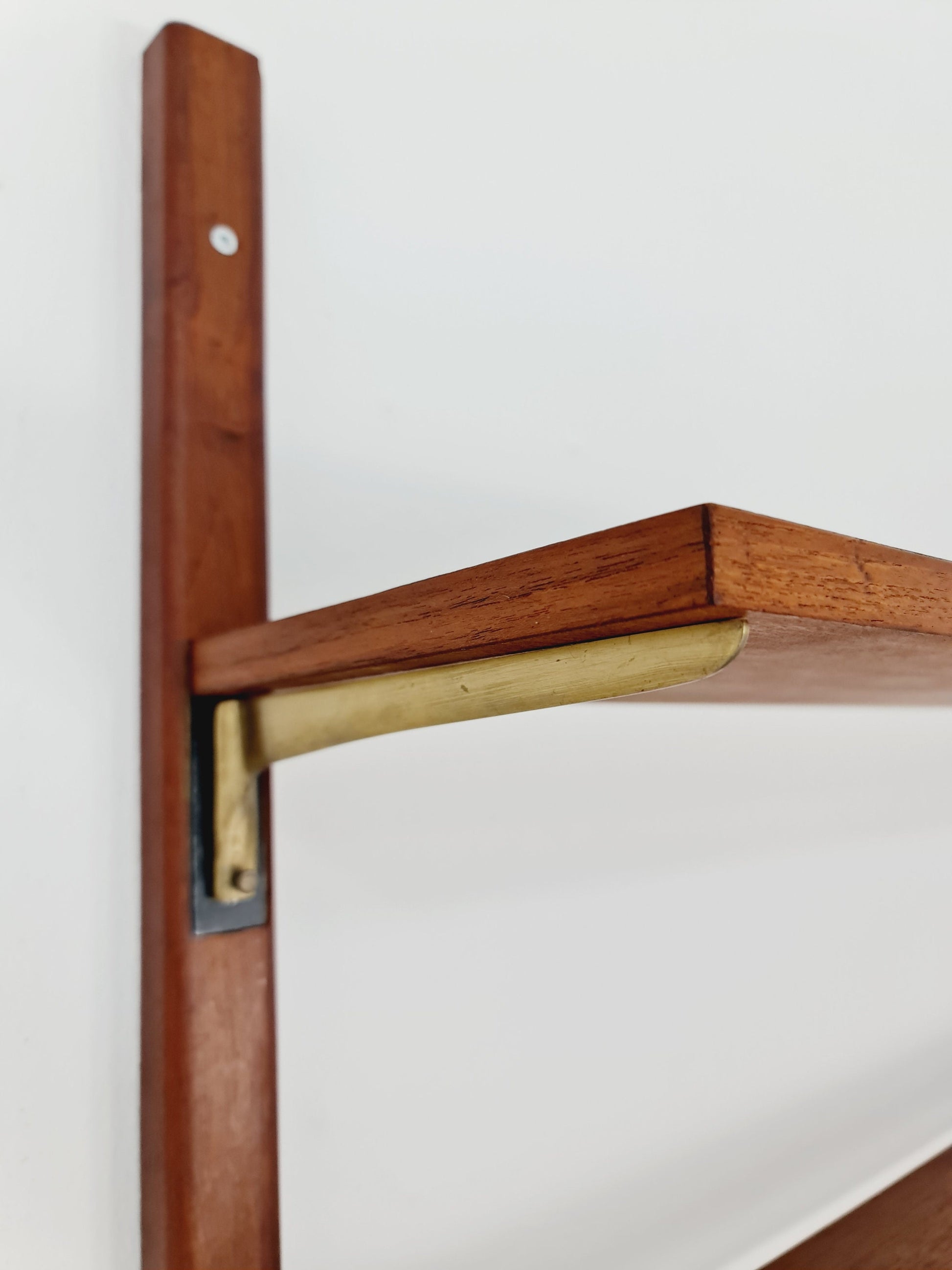 Rare Wall-mounted original teak Danish brass shelf-system bookcase, 1960s