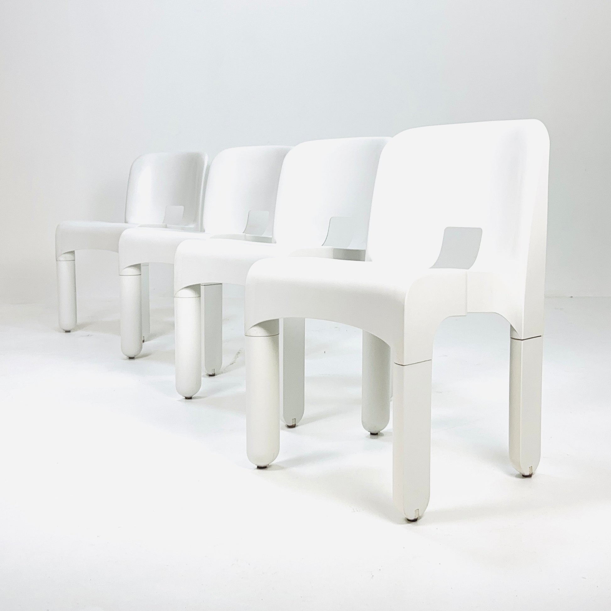 Set of 4 Space age Universale white chairs,designed by Joe Colombo for Kartell Italy 1960s