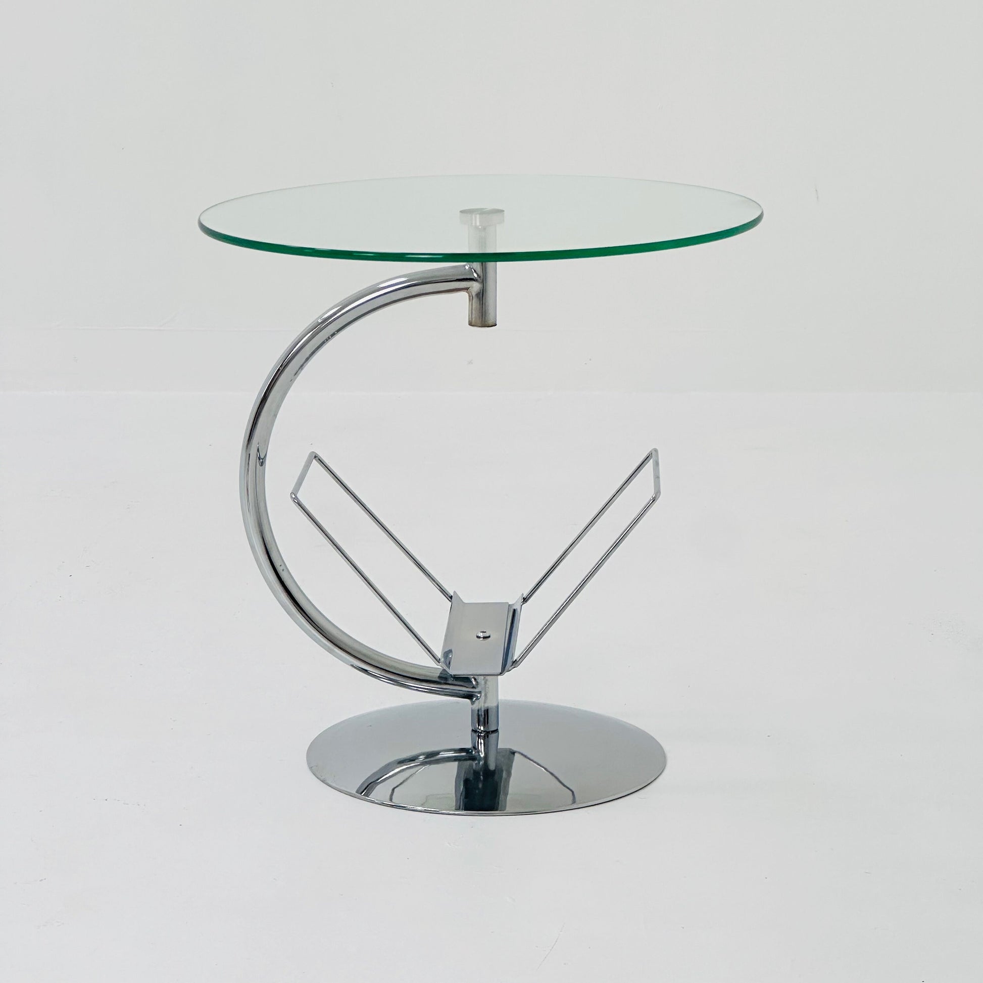Mid century designer side table / magazine table. chrome and glass top, Italy