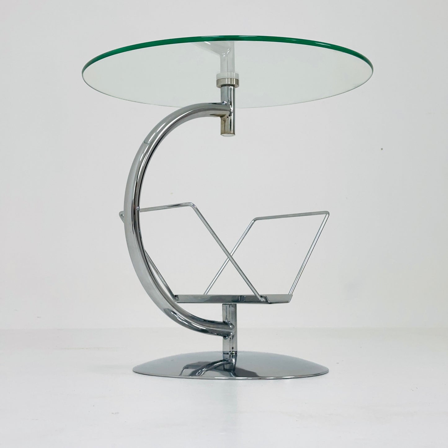 Mid century designer side table / magazine table. chrome and glass top, Italy