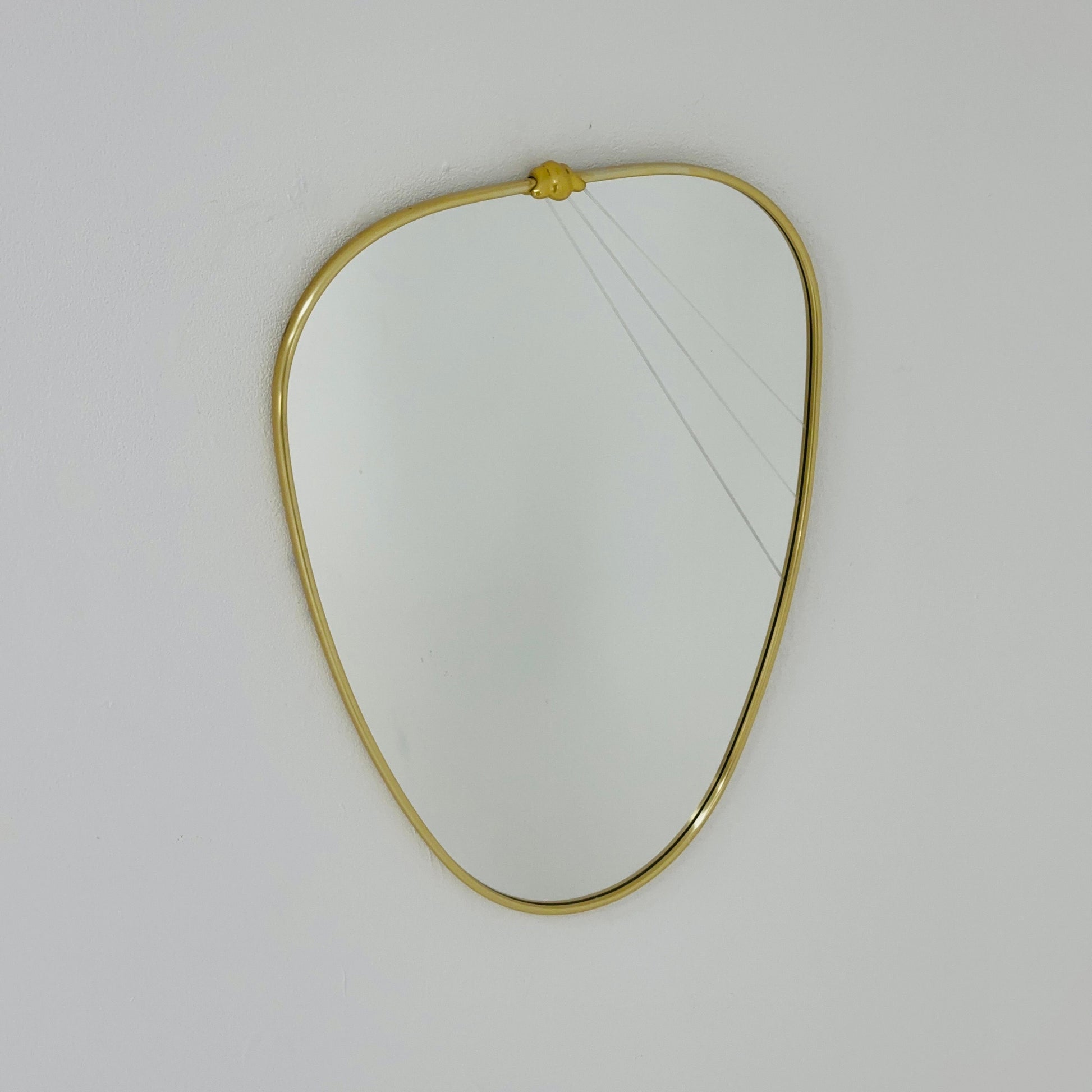 Mid Century asymmetric German brass Original kidney wall mirror from the 60s model number 986