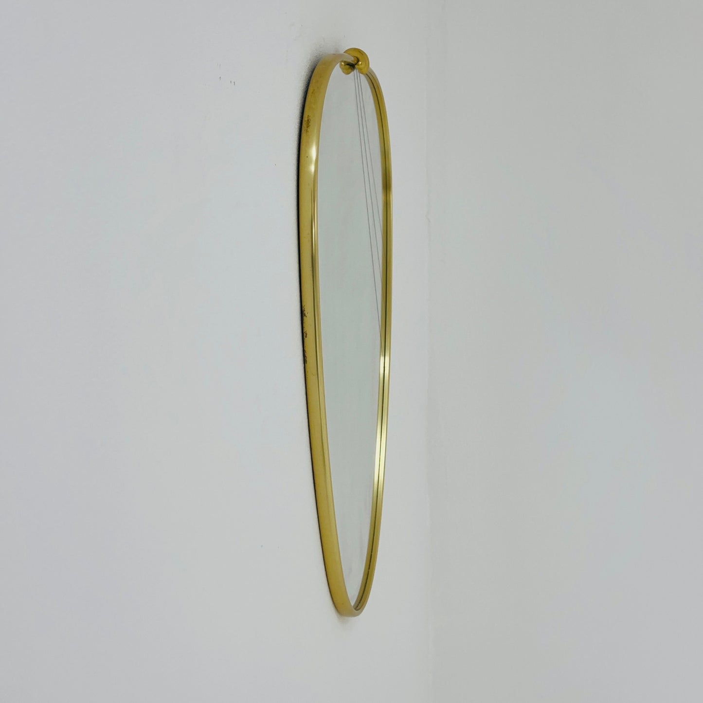 Mid Century asymmetric German brass Original kidney wall mirror from the 60s model number 986