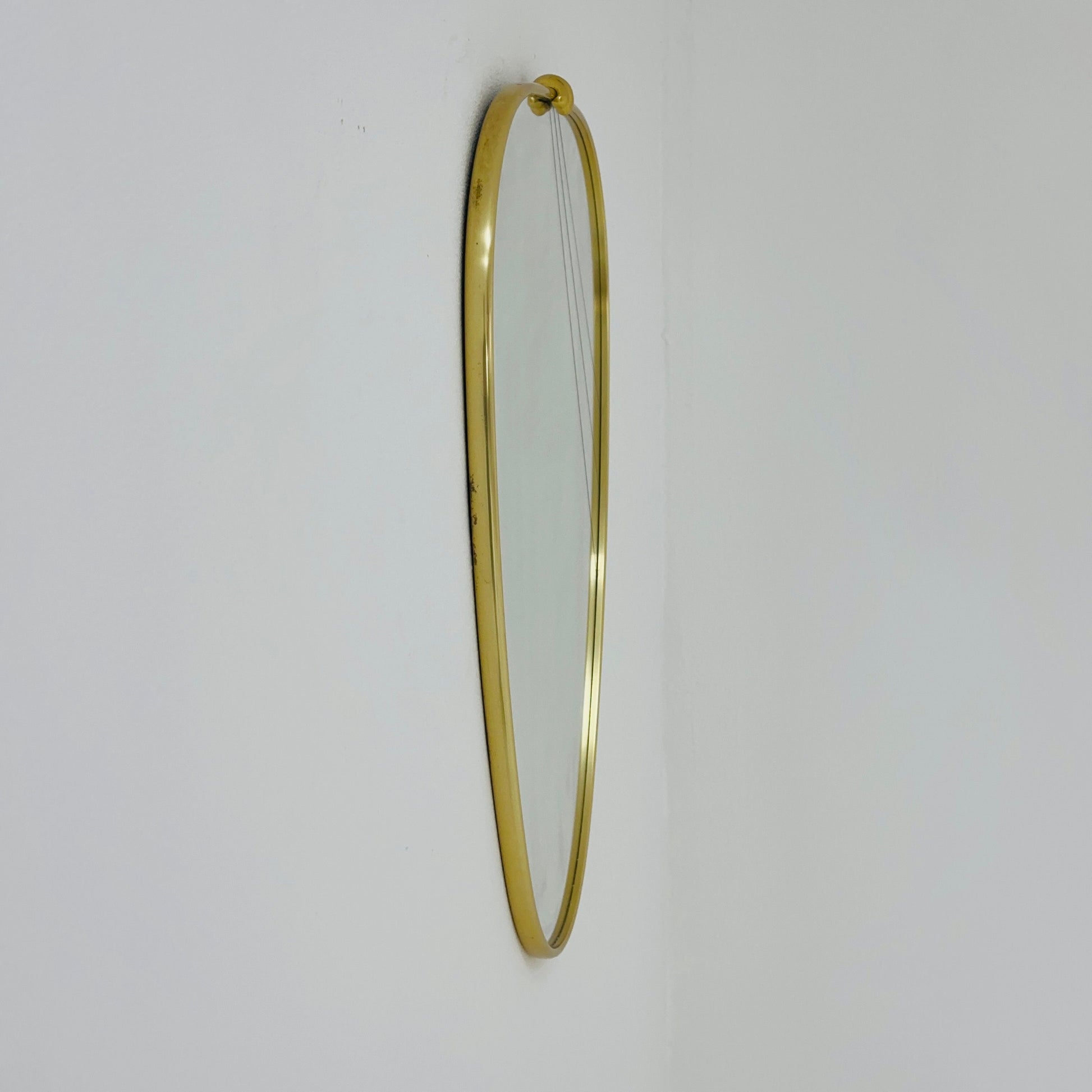 Mid Century asymmetric German brass Original kidney wall mirror from the 60s model number 986