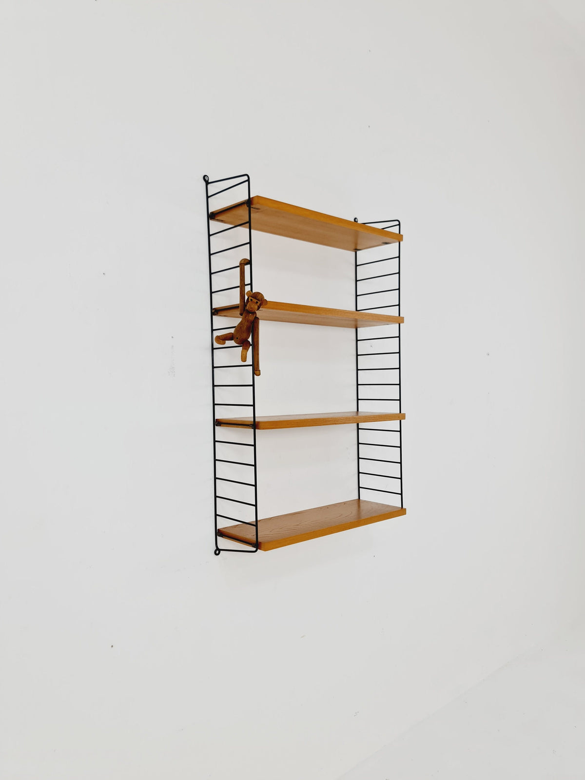 Original MCM Ash shelving system - consists of Black lacquered metal ladders, from string Stockholm 1960s
