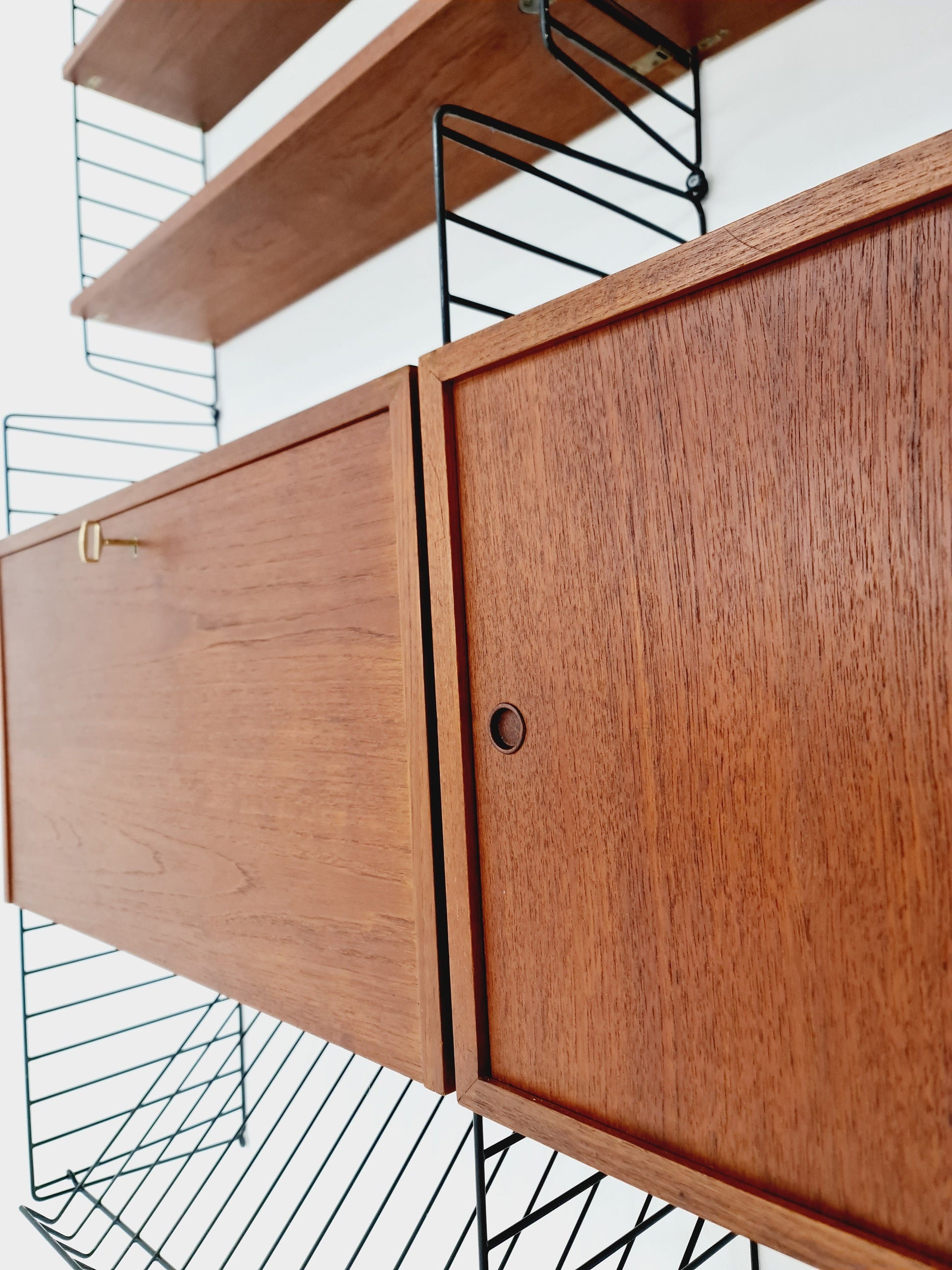 Wall-mounted original Swedish string shelf-system, bookcase teak by Nils & Kajsa Strinning, 1960s