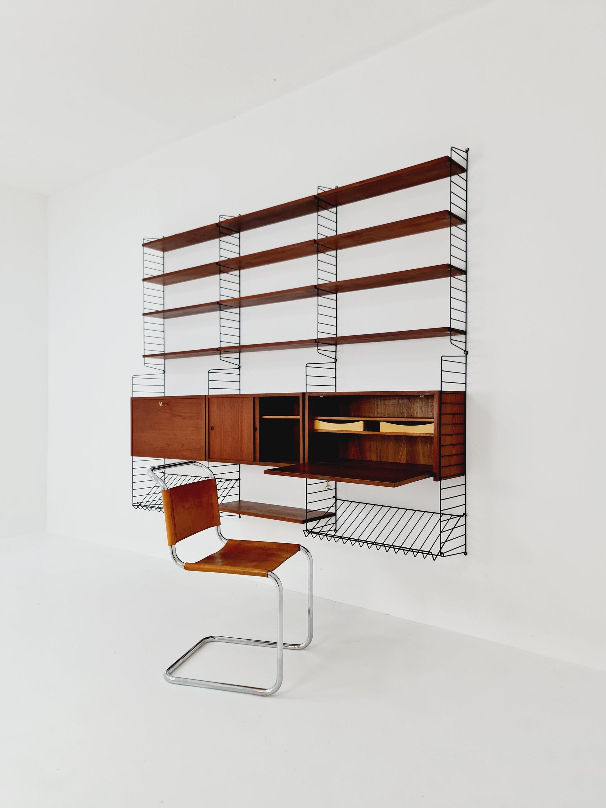 Wall-mounted original Swedish string shelf-system, bookcase teak by Nils & Kajsa Strinning, 1960s