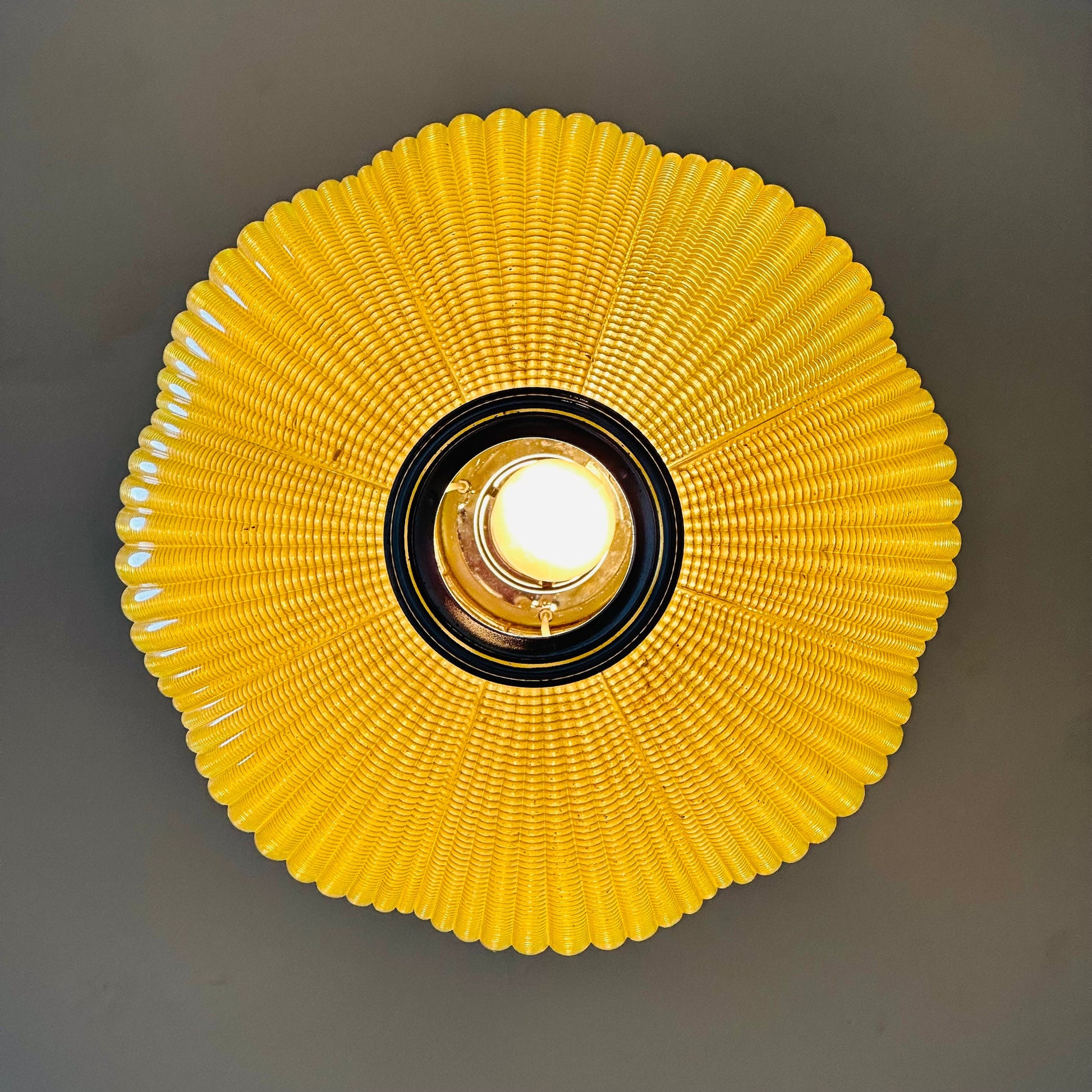 Space age ball yellow plastic pendant lamp Germany 1970s