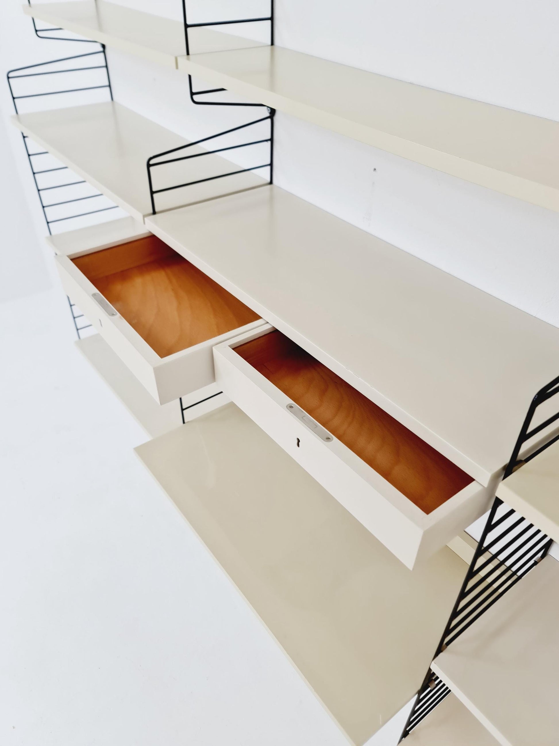 Wall-mounted original Swedish string shelf-system, bookcase teak by Nils & Kajsa Strinning, 1960s