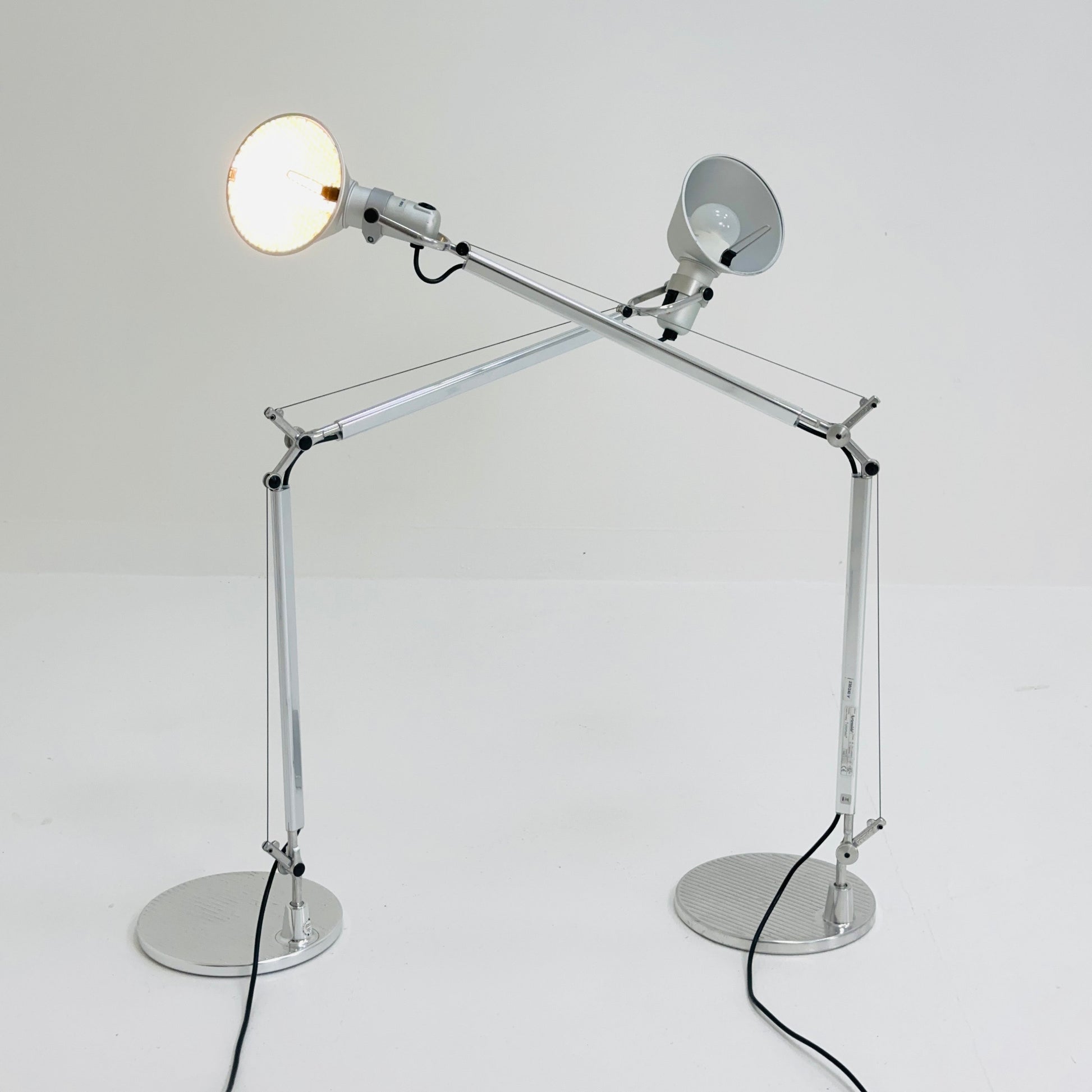 A pair of 'Tolomeo' desktop lamps by Michele De Lucchi & Giancarlo Fassina for Artemide. Italy