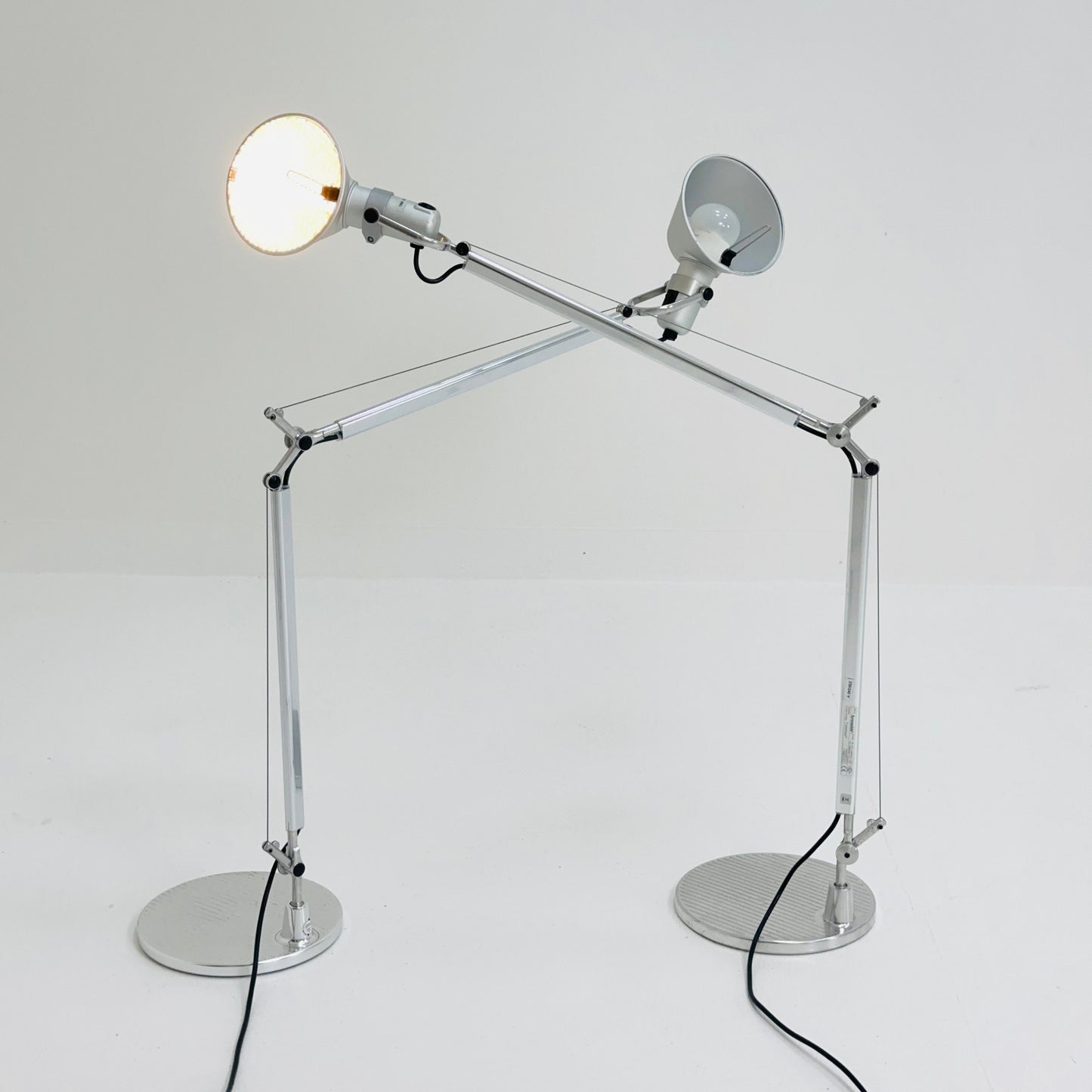 A pair of 'Tolomeo' desktop lamps by Michele De Lucchi & Giancarlo Fassina for Artemide. Italy