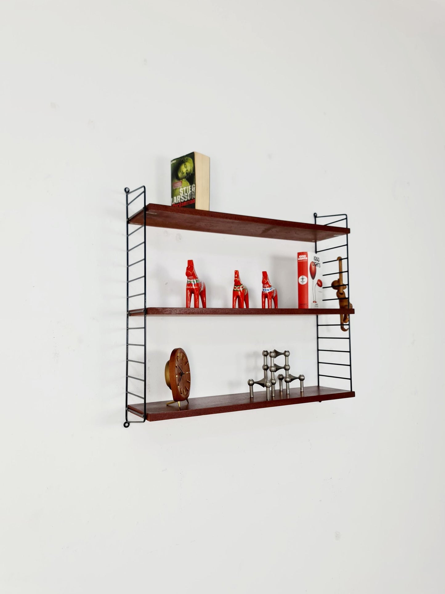 Original MCM Teak shelving system - consists of black lacquered metal ladders, from string Stockholm 1960s