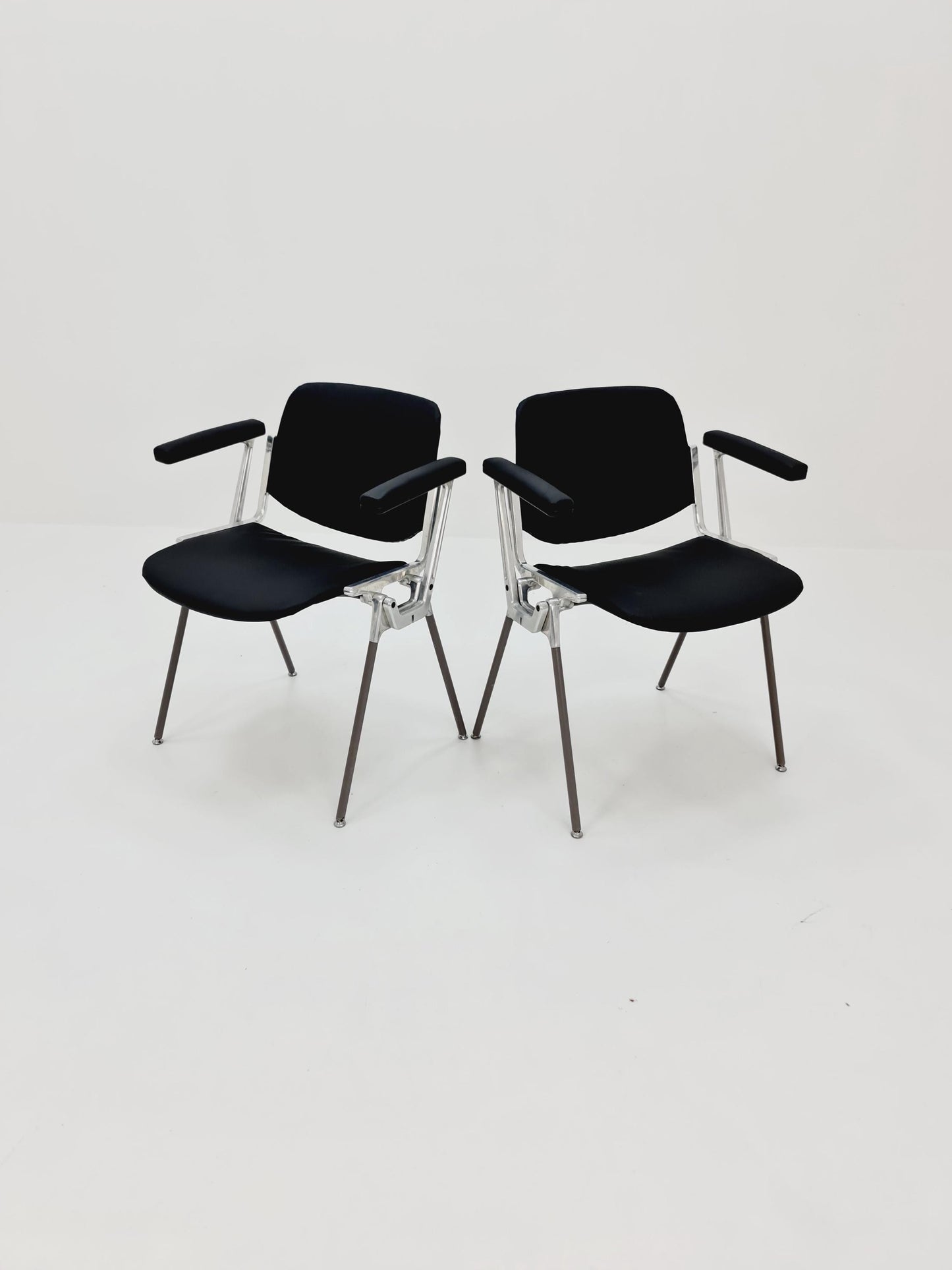 1 / 2 Italian black leatherite Castelli arm chairs by Giancarlo Piretti, 1970s
