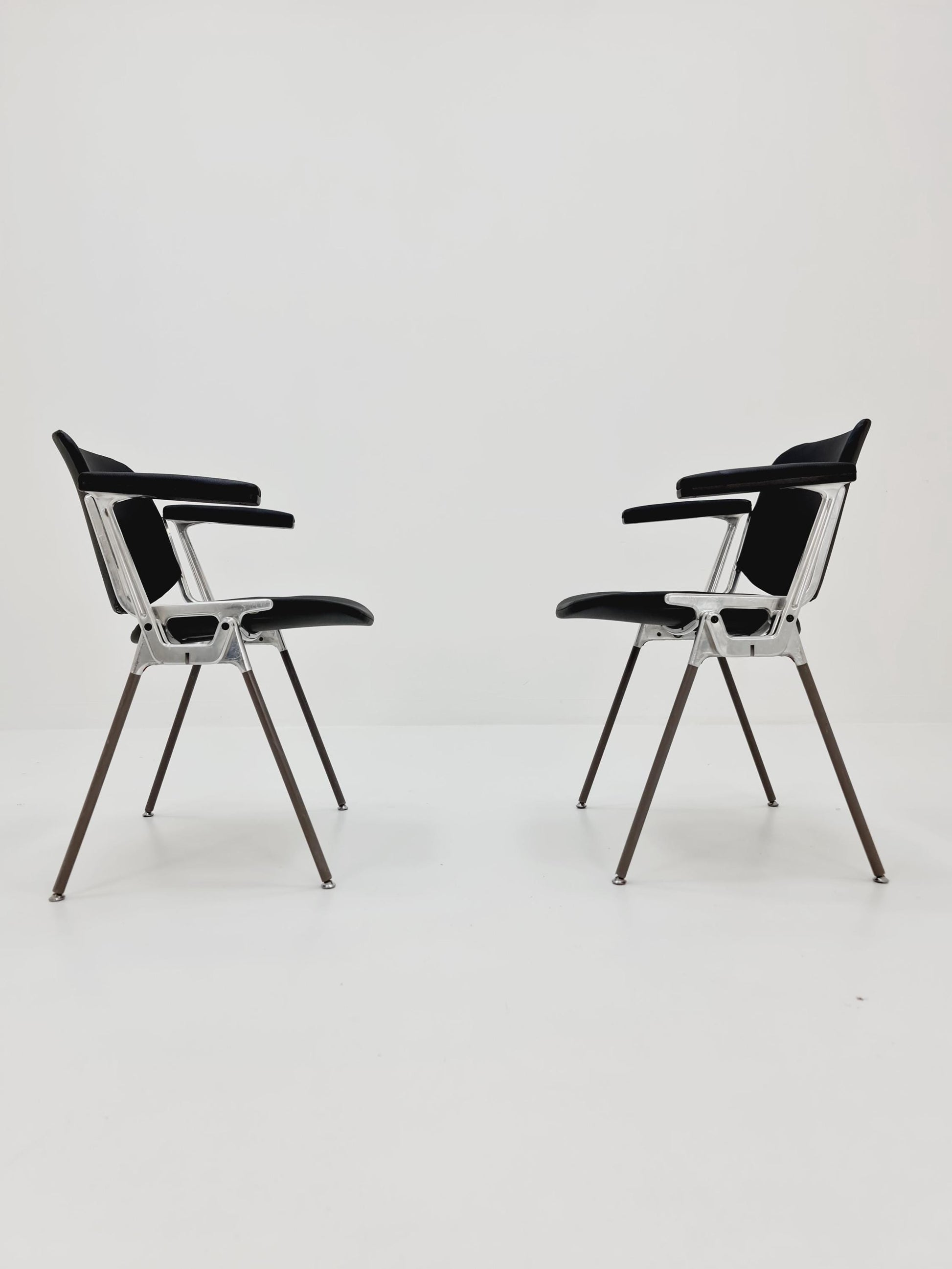 1 / 2 Italian black leatherite Castelli arm chairs by Giancarlo Piretti, 1970s