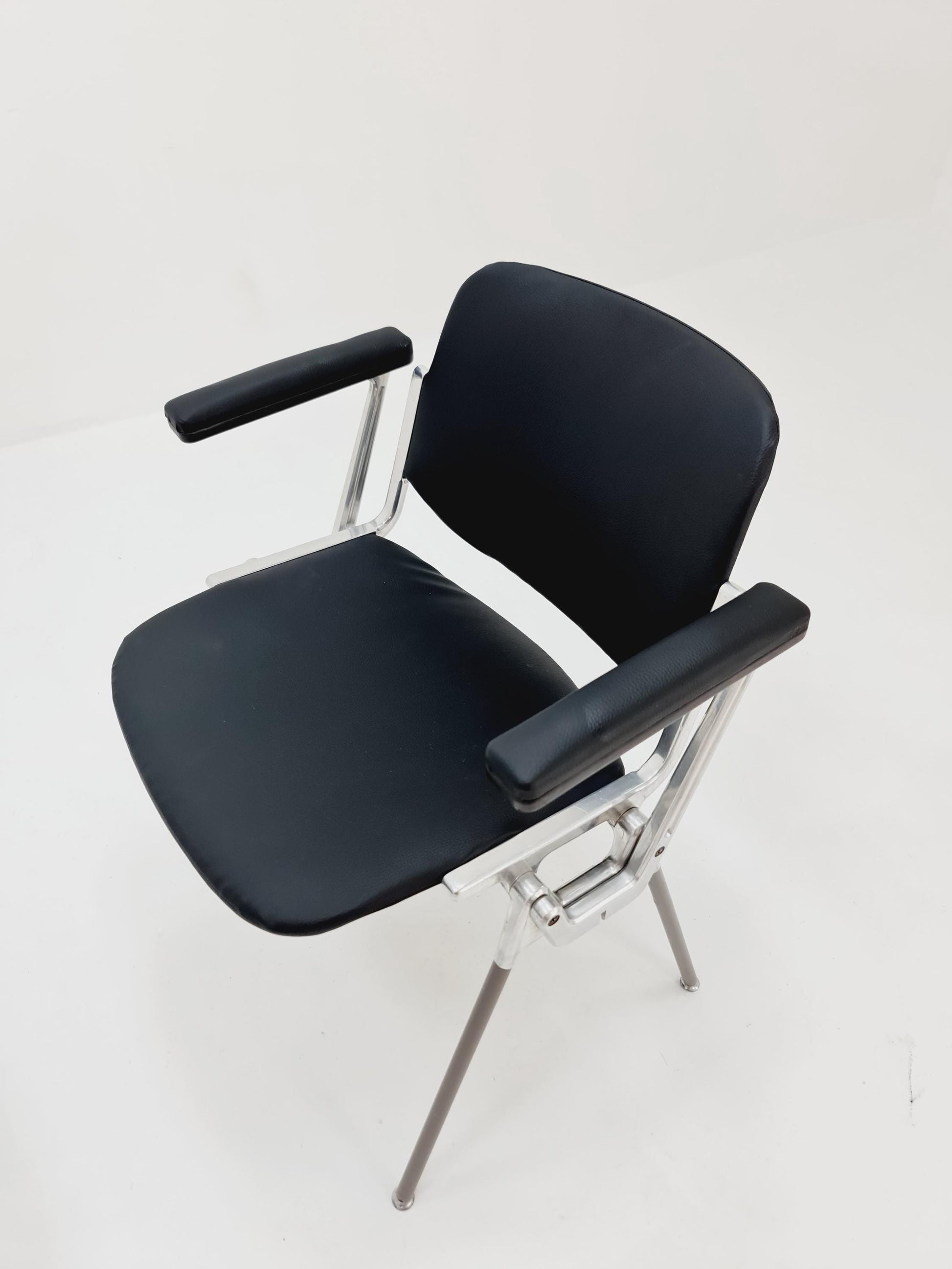 1 / 2 Italian black leatherite Castelli arm chairs by Giancarlo Piretti, 1970s