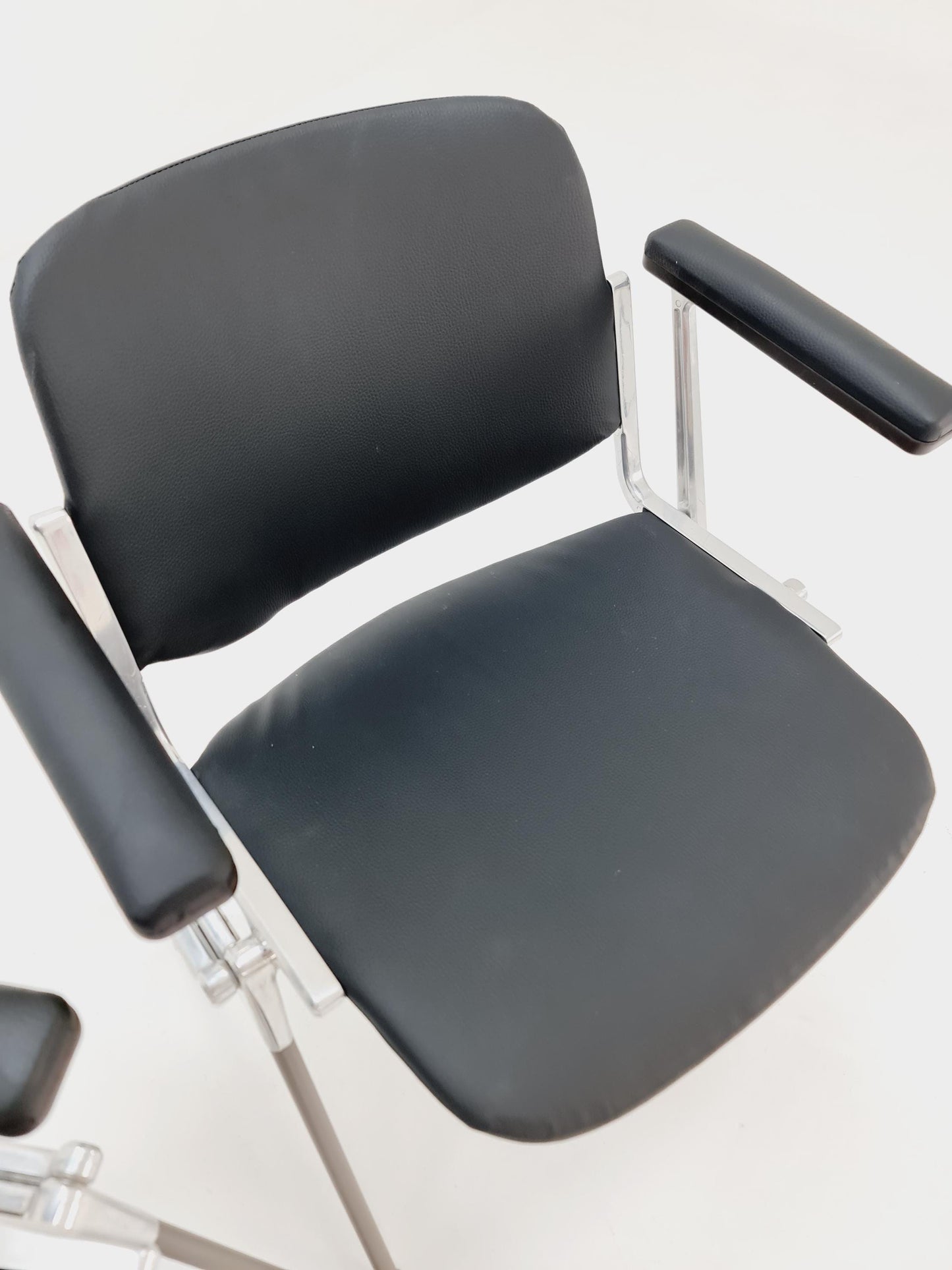 1 / 2 Italian black leatherite Castelli arm chairs by Giancarlo Piretti, 1970s