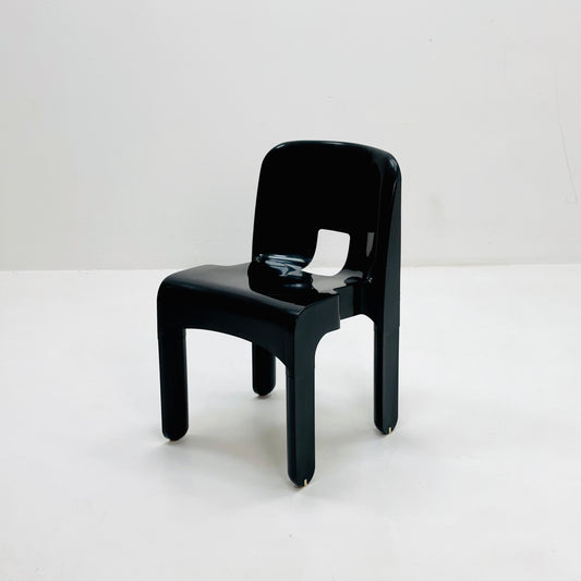 Space age Universale plastic black chair model 4867 ,designed by Joe Colombo for Kartell Italy. 1970s