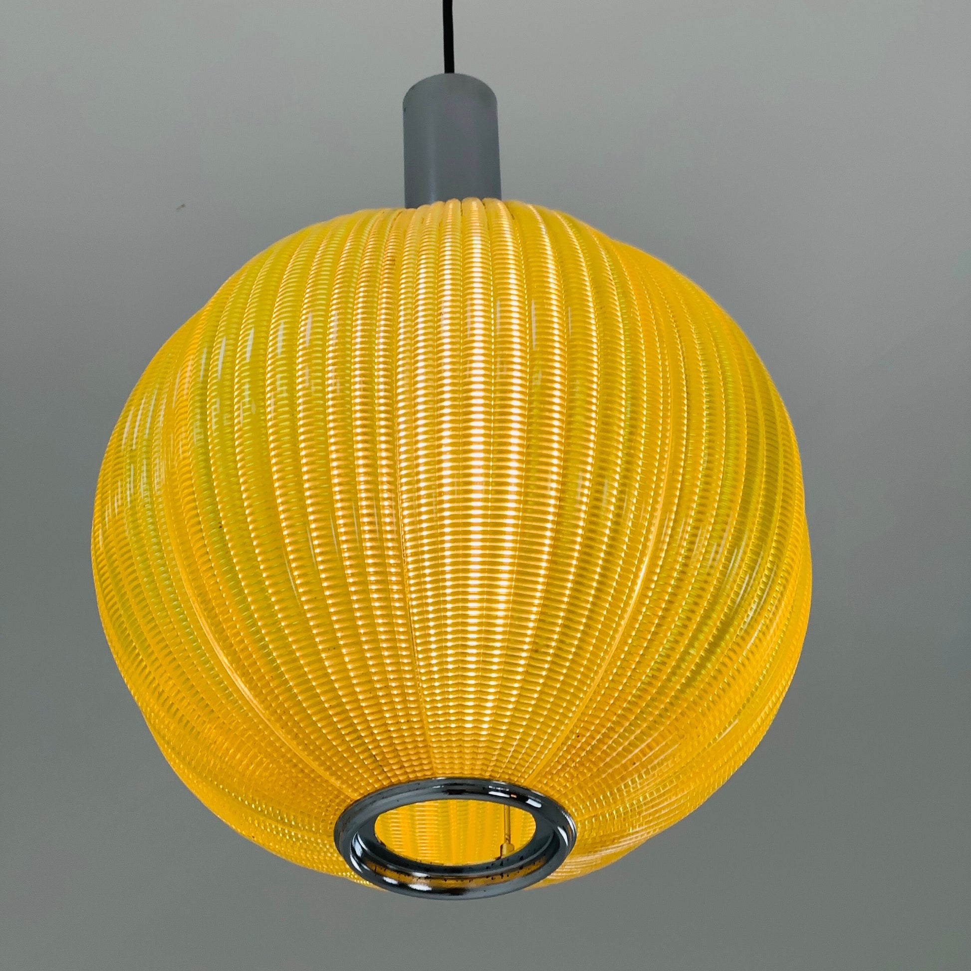 Space age ball yellow plastic pendant lamp Germany 1970s