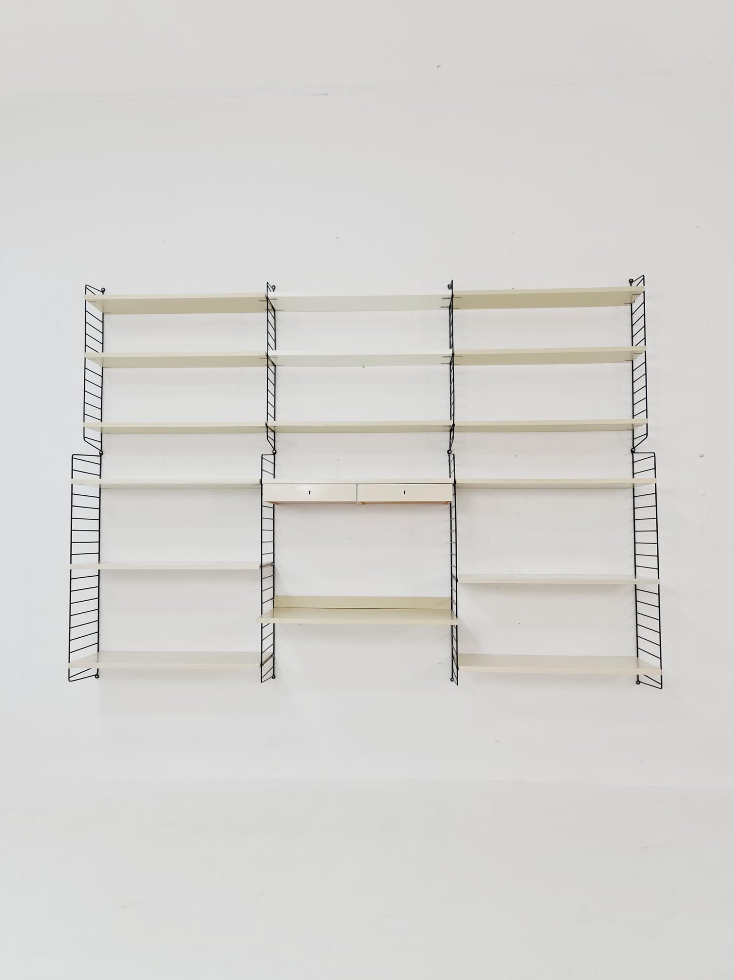 Wall-mounted original Swedish string shelf-system, bookcase teak by Nils & Kajsa Strinning, 1960s