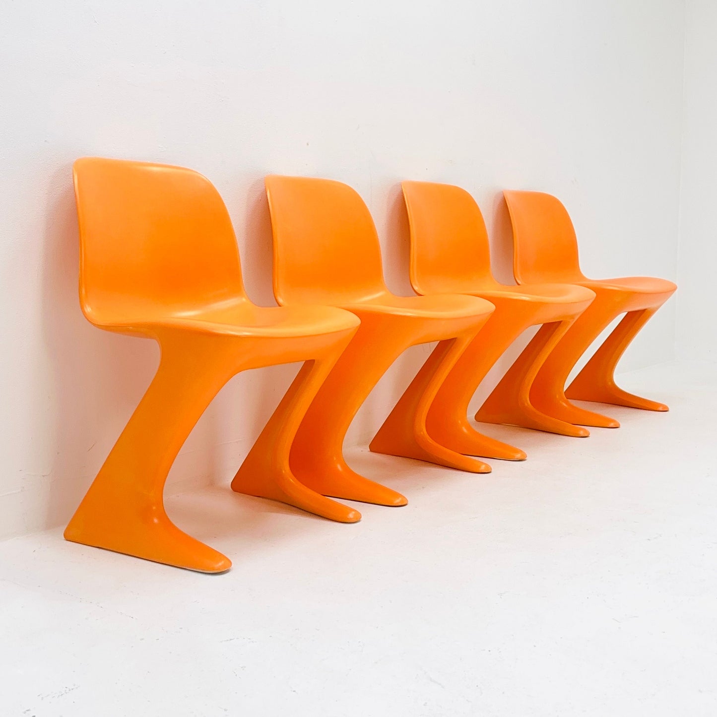 Set of 4 space age Orange “Kangaroo” chairs by Ernst Moeckl Germany 1960s