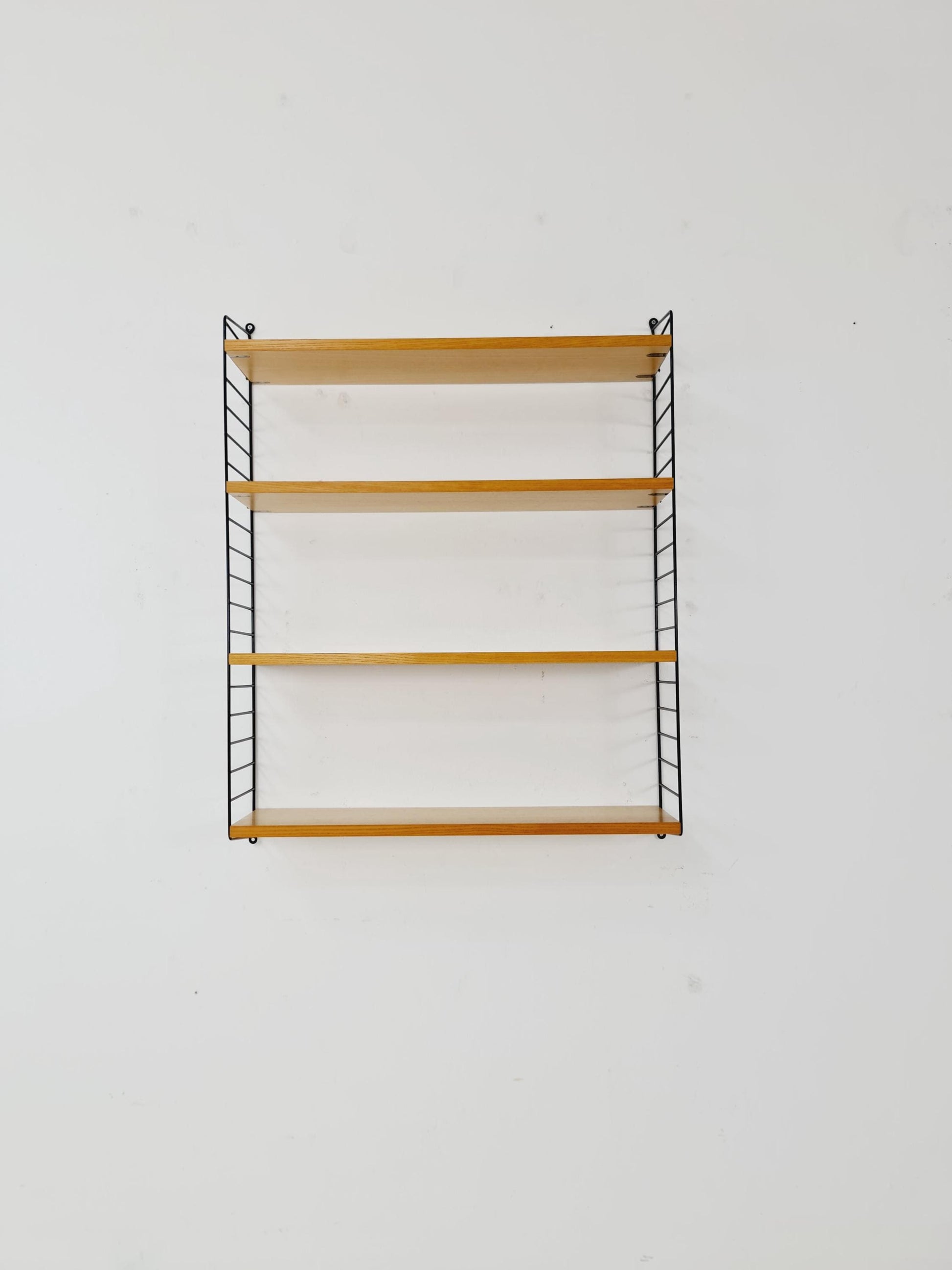 Original MCM Ash shelving system - consists of Black lacquered metal ladders, from string Stockholm 1960s