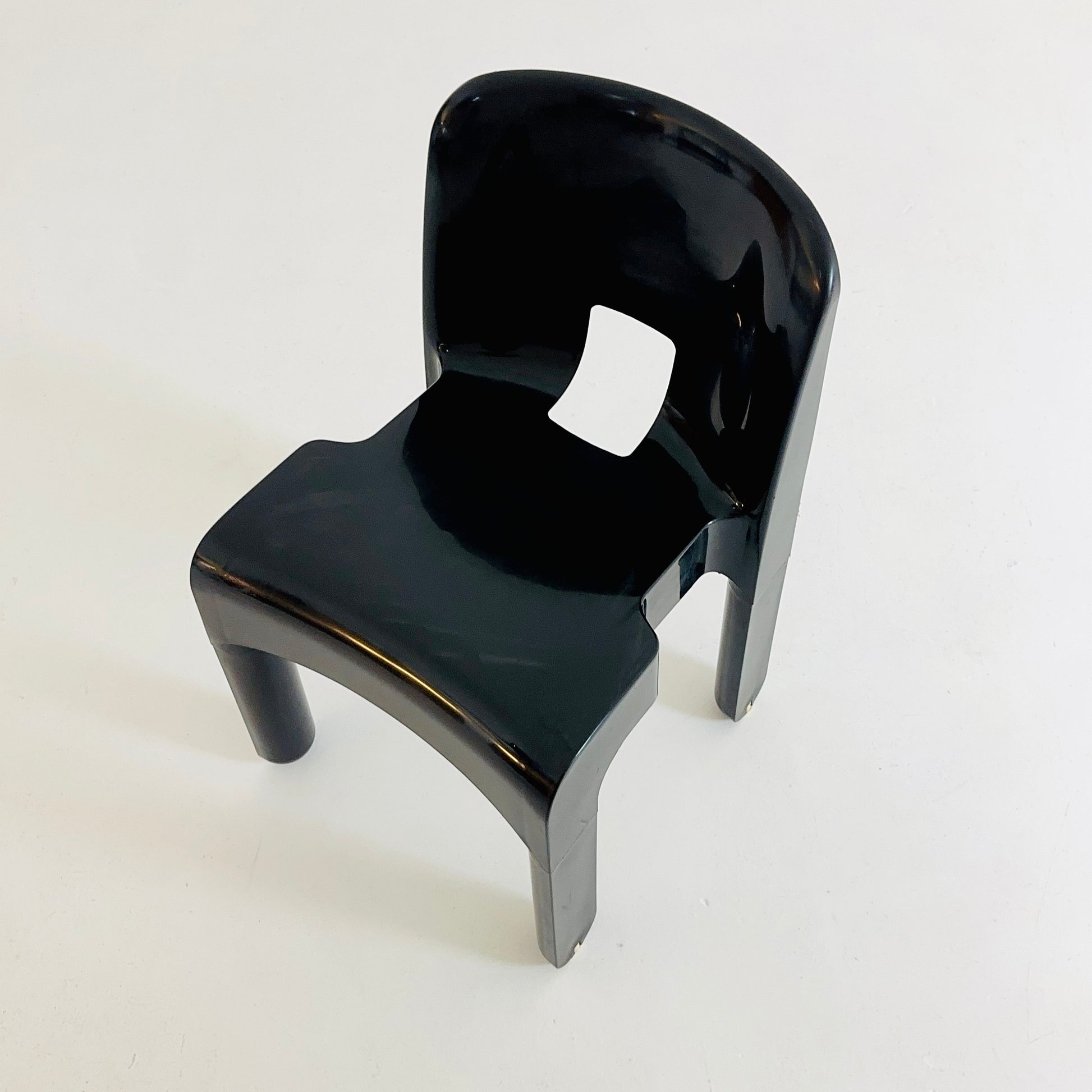 Space age Universale plastic black chair model 4867 ,designed by Joe Colombo for Kartell Italy. 1970s