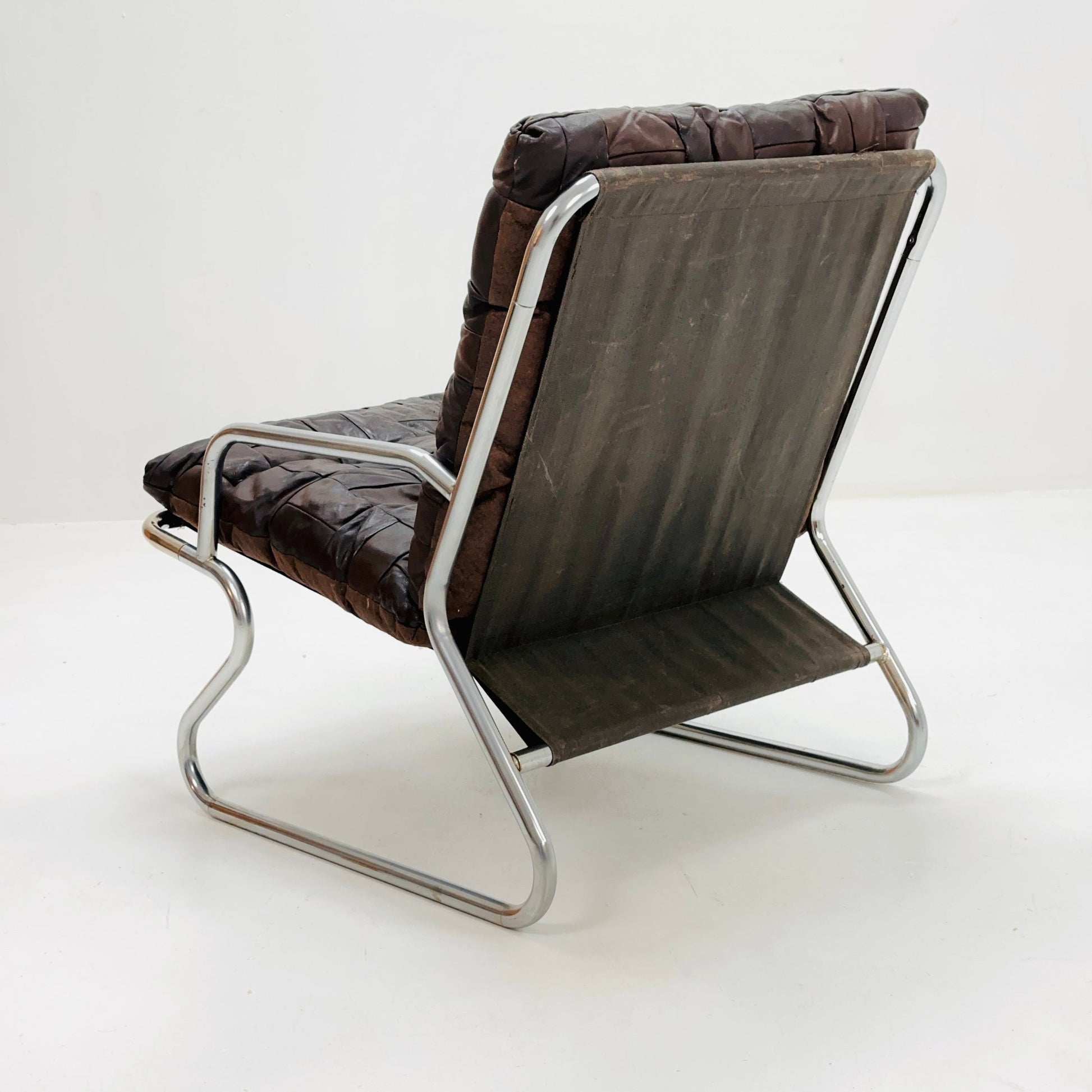 Mid-century sling brown leather lounge chair by Peter Hoyte, 1960s