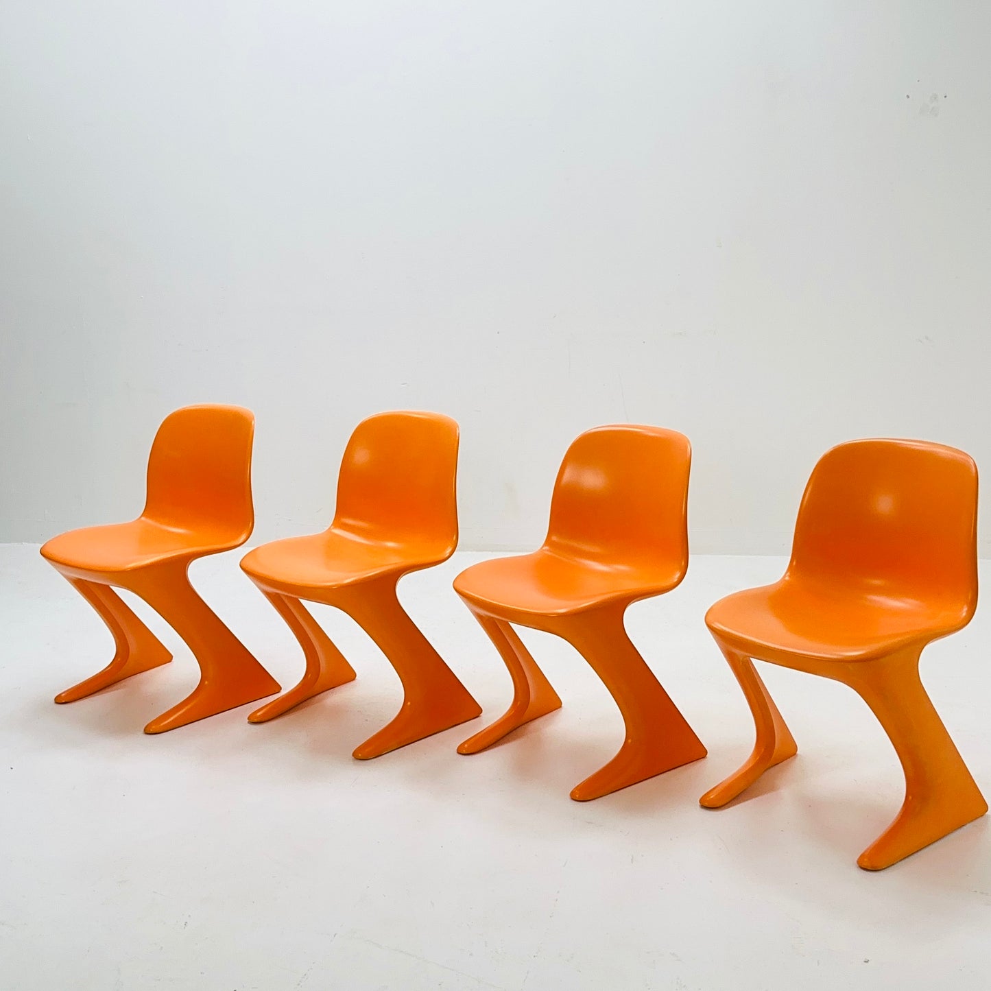 Set of 4 space age Orange “Kangaroo” chairs by Ernst Moeckl Germany 1960s