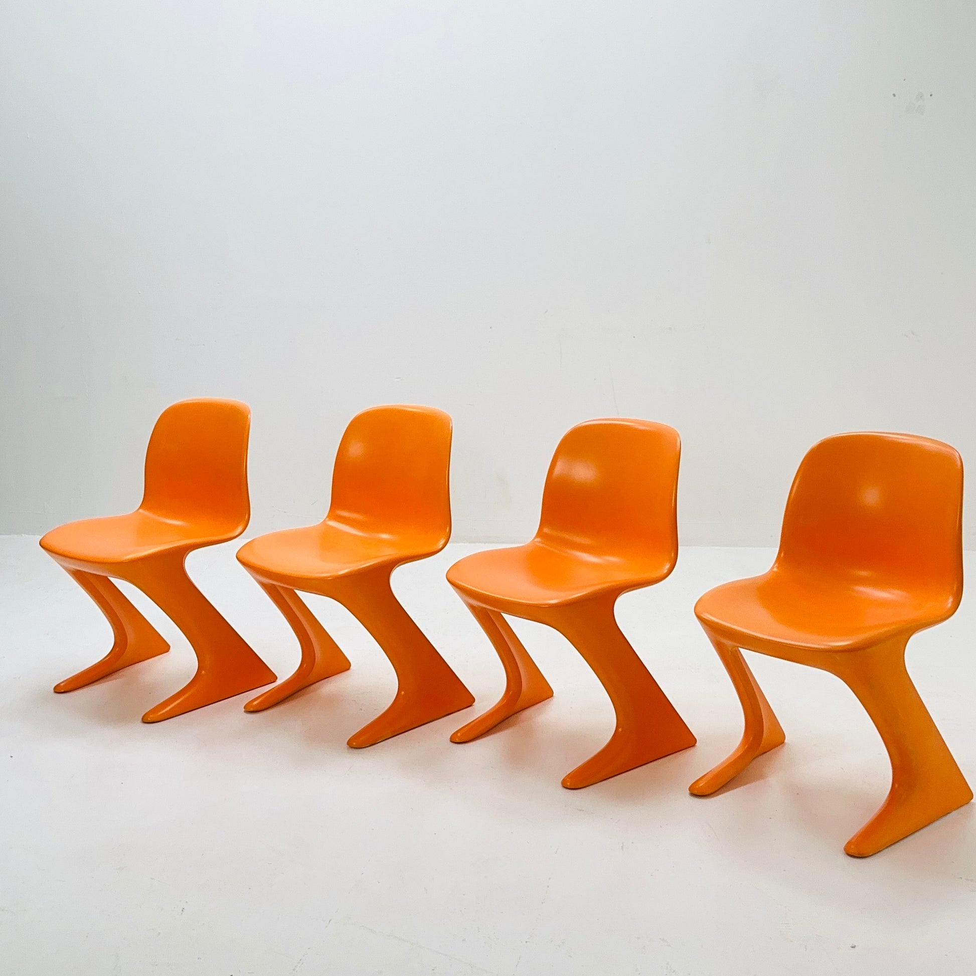 Set of 4 space age Orange “Kangaroo” chairs by Ernst Moeckl Germany 1960s