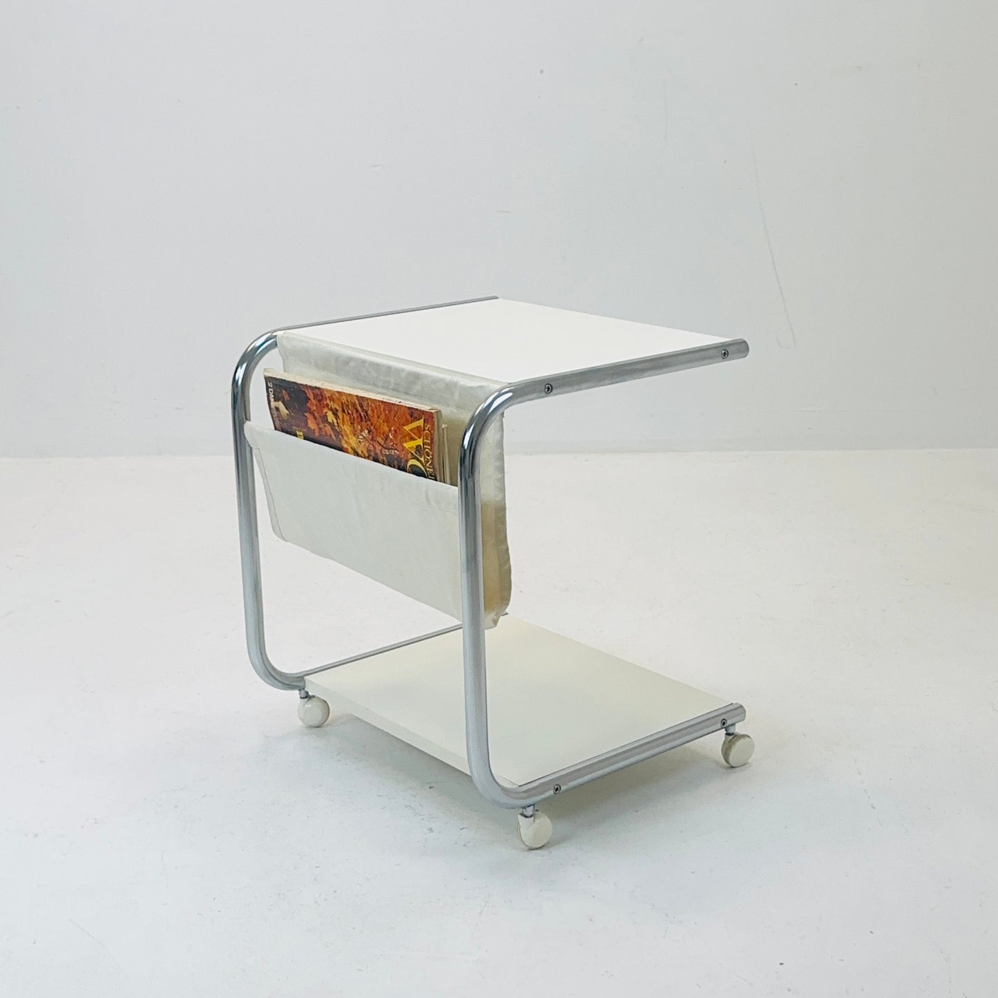 Mid century side table - on rolls by Thomas Jelinek for IKEA Sweden 1980s