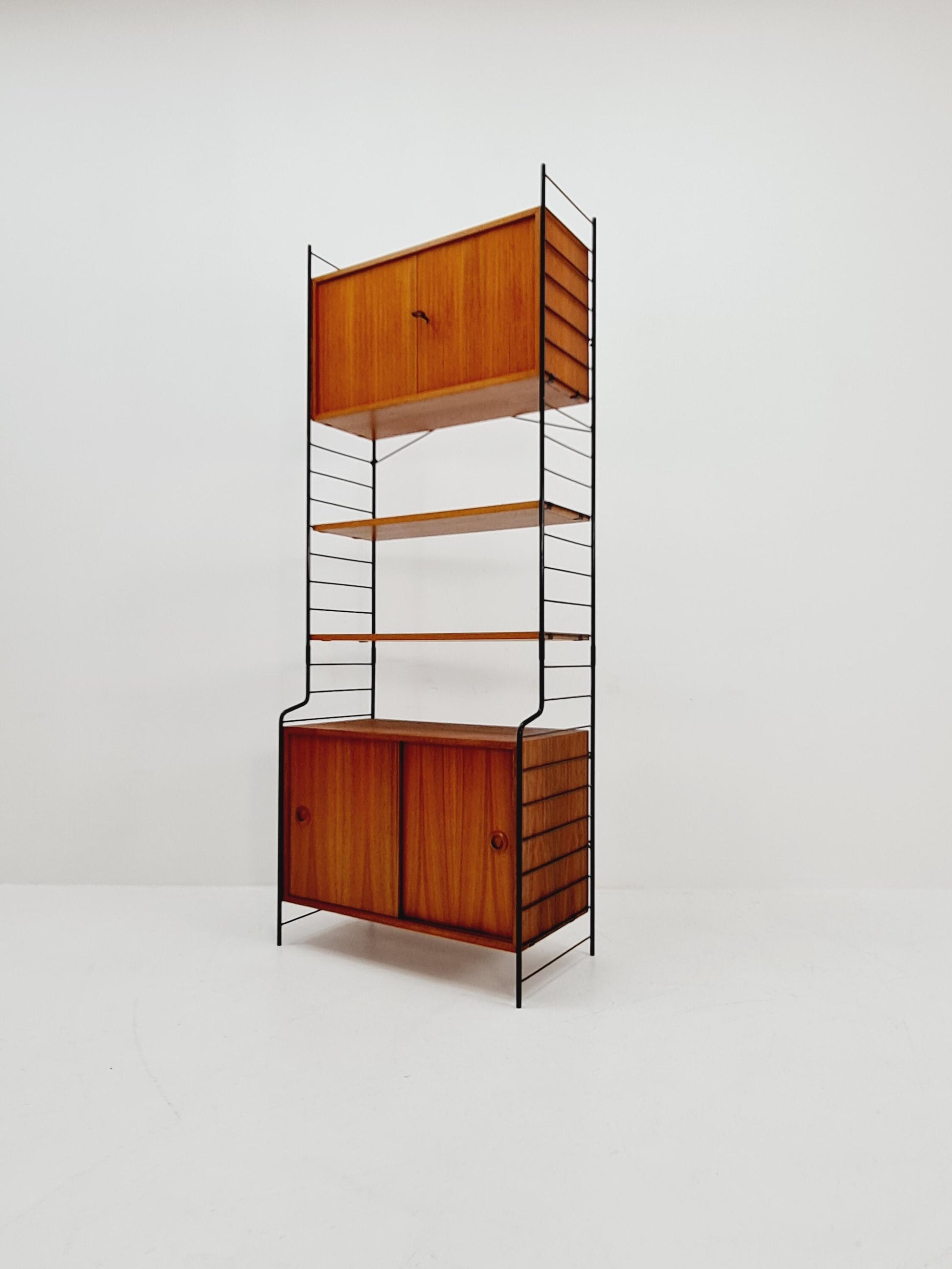 Free standing String shelf-system, bookcase with cabinet teak by WHB Germany, 1950s