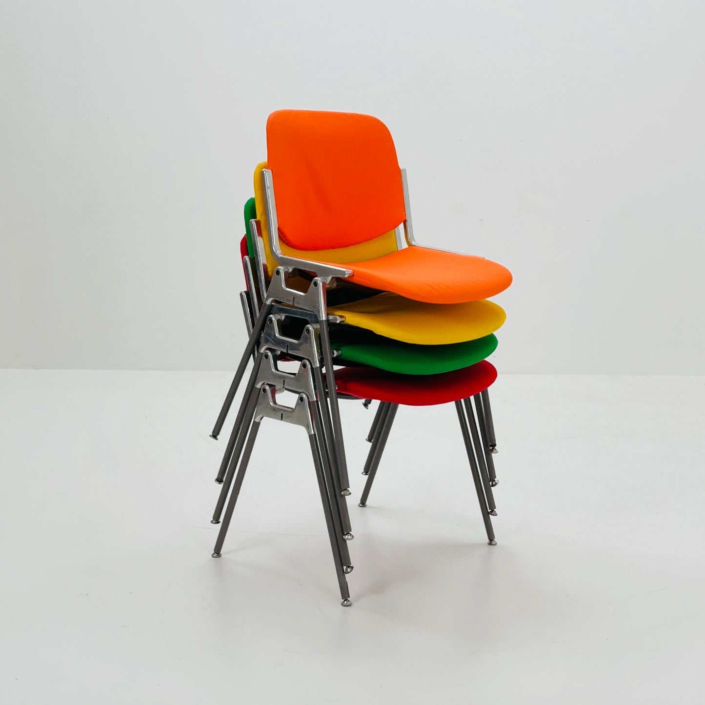 Set of 4 Colors Mid century Stackable chairs by Giancarlo Piretti for Anomima Castelli ,Italy 1960s