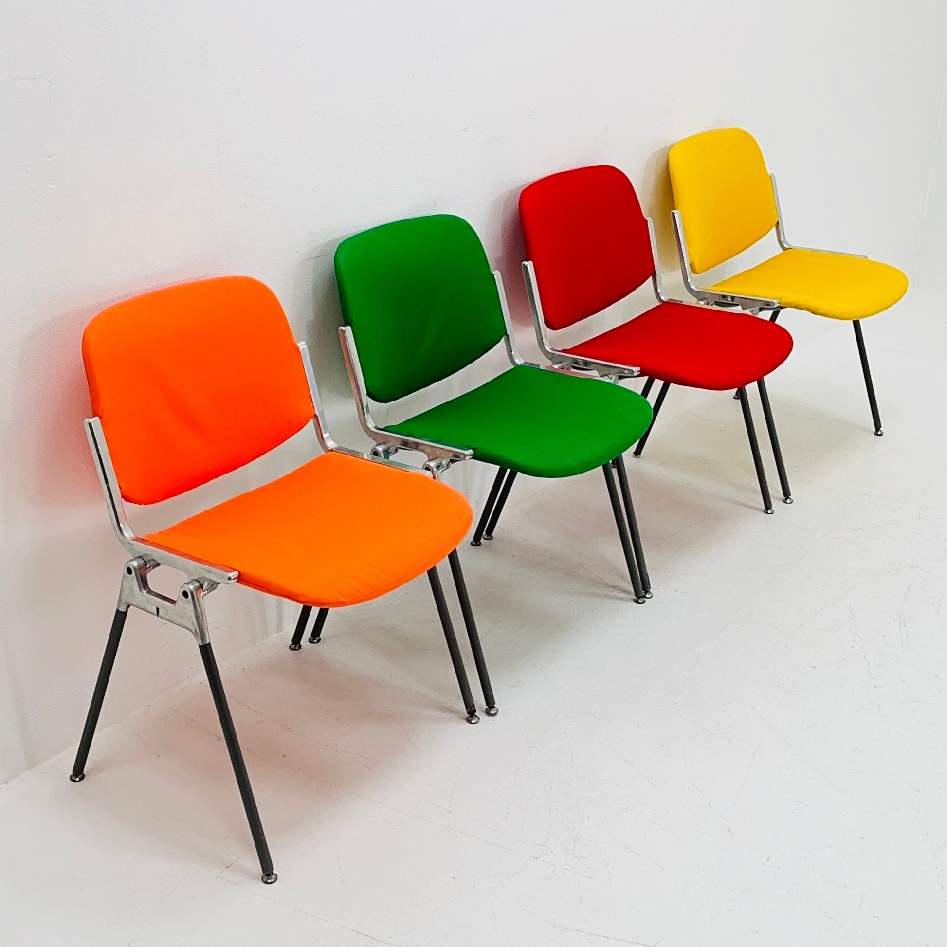 Set of 4 Colors Mid century Stackable chairs by Giancarlo Piretti for Anomima Castelli ,Italy 1960s