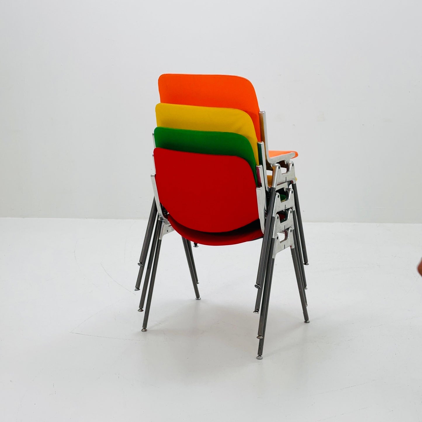 Set of 4 Colors Mid century Stackable chairs by Giancarlo Piretti for Anomima Castelli ,Italy 1960s