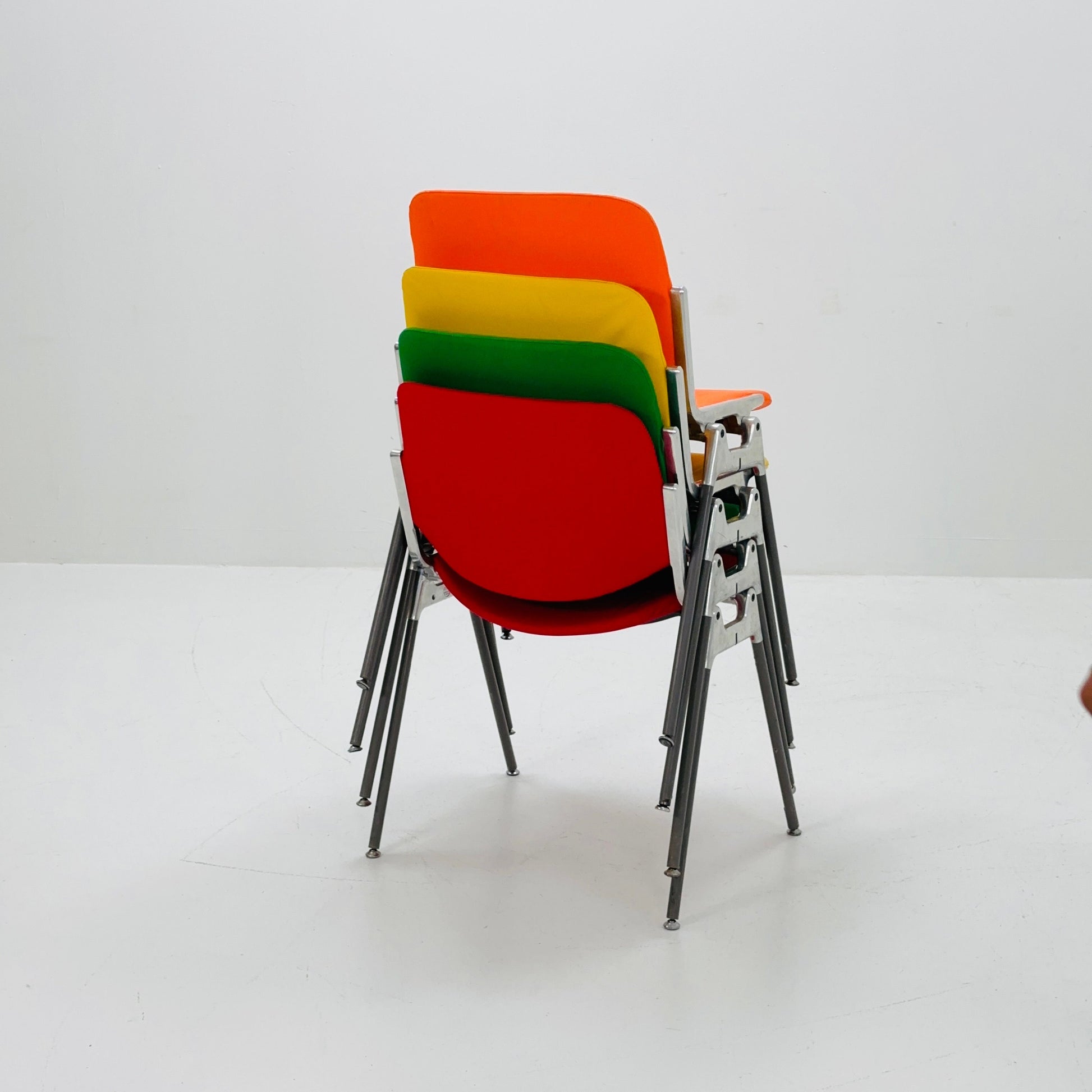 Set of 4 Colors Mid century Stackable chairs by Giancarlo Piretti for Anomima Castelli ,Italy 1960s