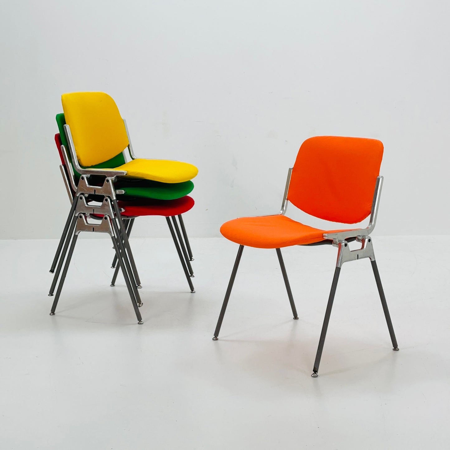 Set of 4 Colors Mid century Stackable chairs by Giancarlo Piretti for Anomima Castelli ,Italy 1960s