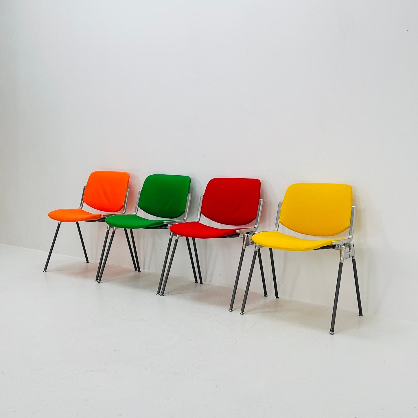Set of 4 Colors Mid century Stackable chairs by Giancarlo Piretti for Anomima Castelli ,Italy 1960s