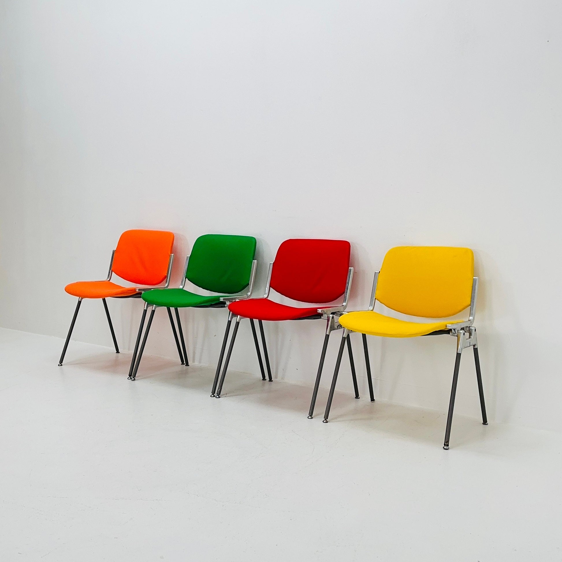 Set of 4 Colors Mid century Stackable chairs by Giancarlo Piretti for Anomima Castelli ,Italy 1960s