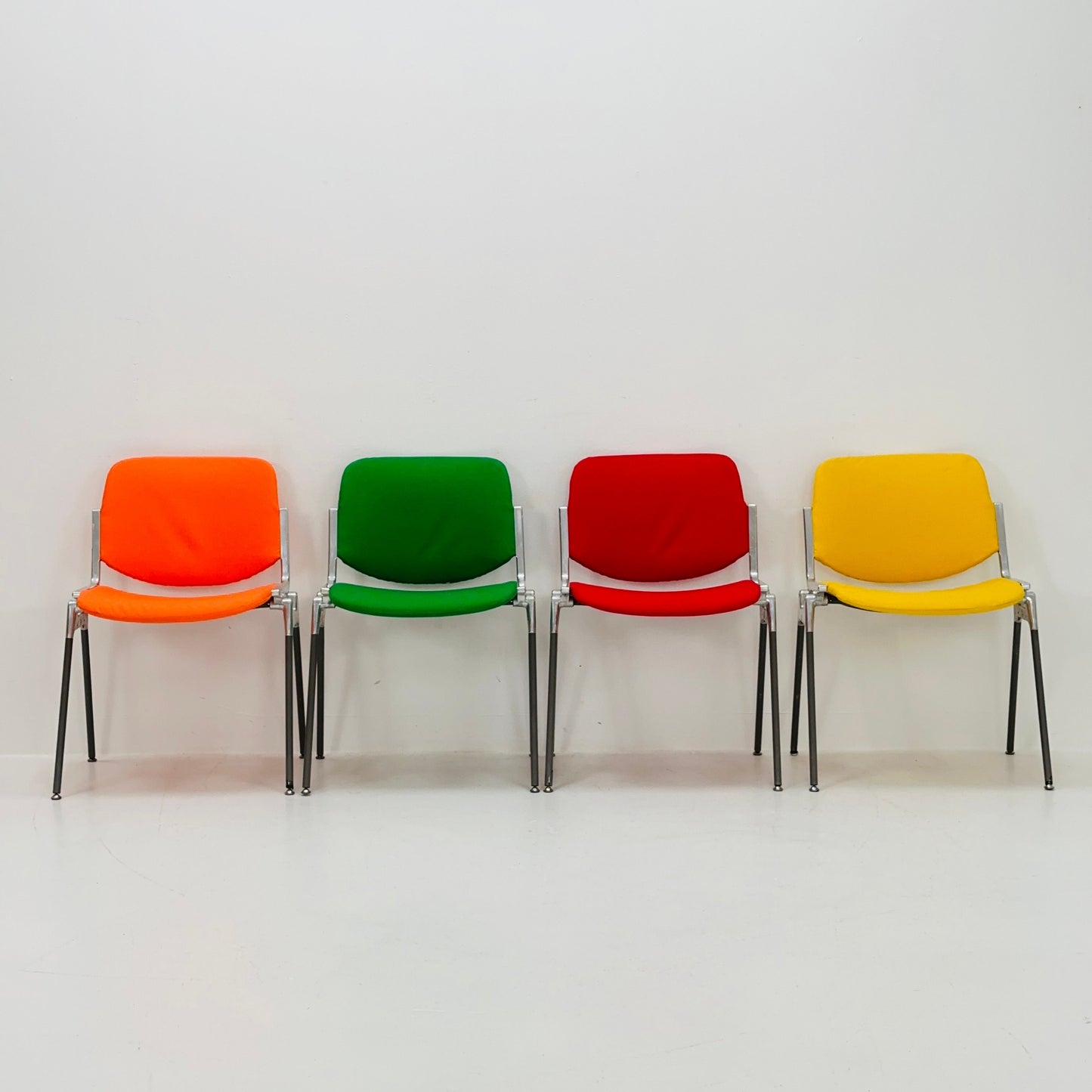 Set of 4 Colors Mid century Stackable chairs by Giancarlo Piretti for Anomima Castelli ,Italy 1960s